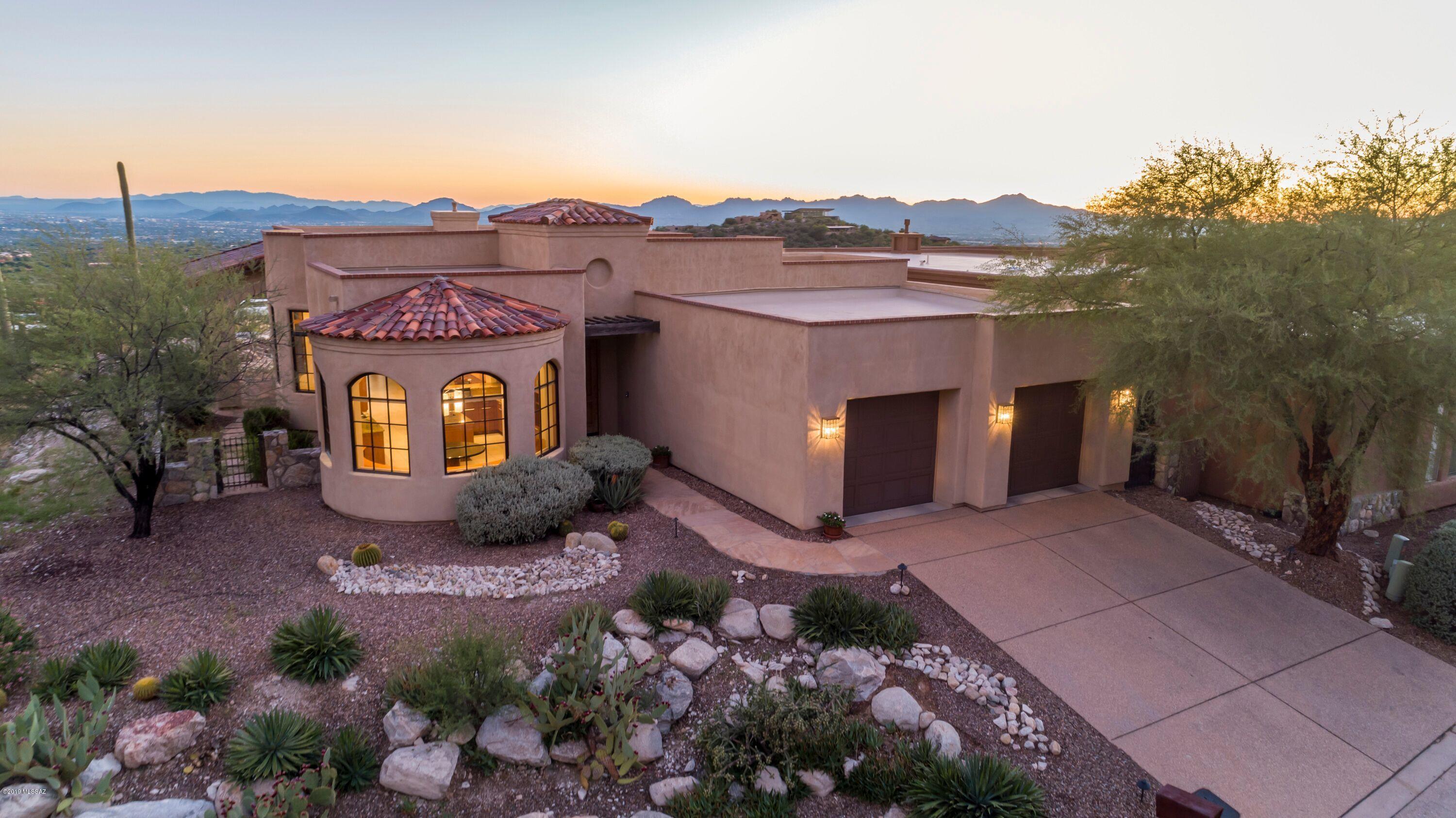 Jetliner Views! Beautiful 3 Bedroom Plus Den Sitting on one of the Best Lots in The Summit at Finger Rock. Mountain City and Sunset Views Surround this Special Property. Open and Bright Floor Plan With the Kitchen Flowing into the Great room with Large Custom Windows to Take in all of the Views. Back Patio With Private in Ground Spa and Twinkling City Lights.
