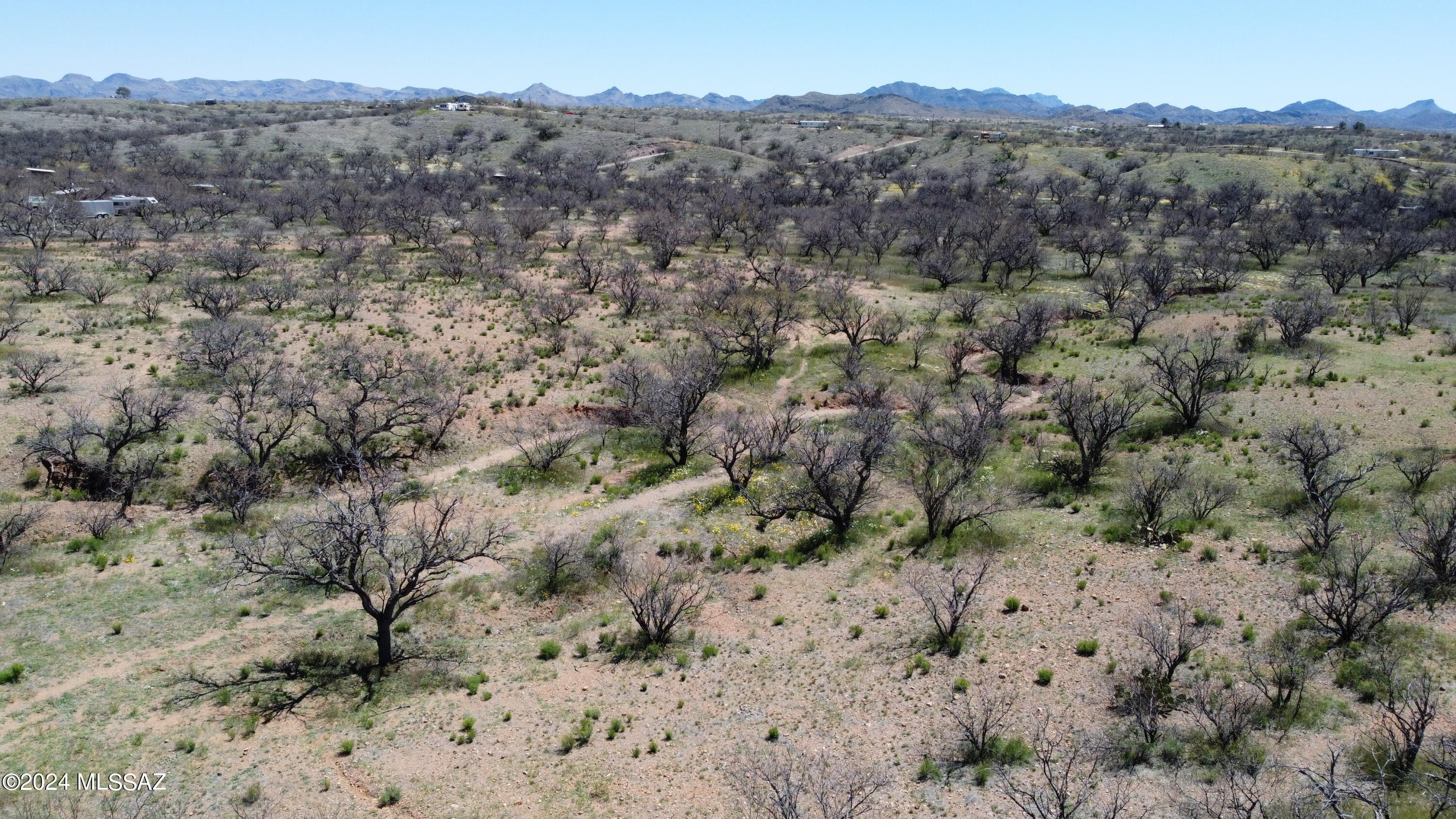 Unimproved land, approximately 5 acres in a scenic Arivaca Location. Neighboring land is also for sale. 36420 S Cedar Creek. Seller Financing available.