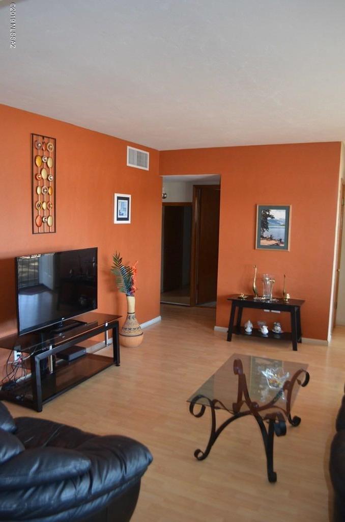 Cozy 3 bedroom, 2 bath with beautiful backyard, formal dining room, all kitchen appliances plus washer/dryer, Electric cost reduction due to solar panels, close to schools and shopping.