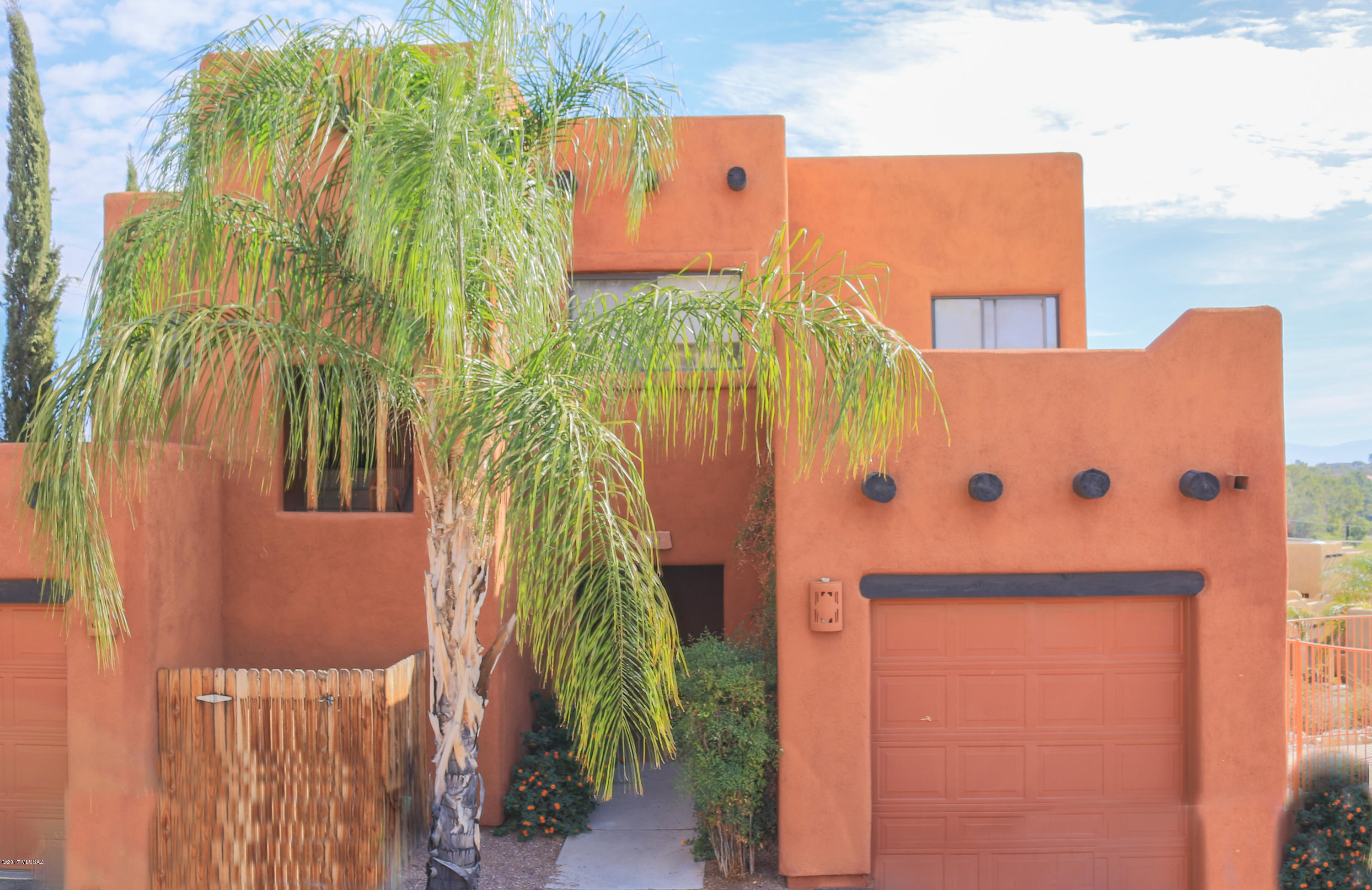 Adorable Santa Fe style condo with 3 separate balconies that offer you 360 degree views that are simply breathtaking! This unit includes 2 bed 2 bath and a den. Ideal open floor plan with a wrap around kitchen, Travertine fireplace in great room and split bedrooms that are spacious with large walk in closets. Direct access to the pool and right around the corner from golfing and shopping. This unit is in a prime location and will not last long! Schedule your showing today!