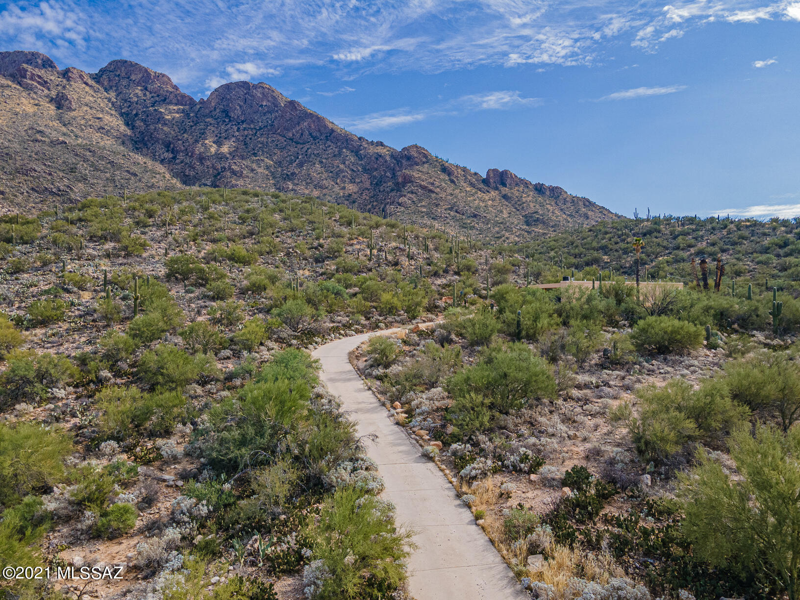 Seller will accept or counter offers between 495-525K. What a fantastic future investment. Build your dream home next to the national forest. Gorgeous 2.5+ acres over looking Oro Valley. This property is backed up to the national forest. All utilities in plus a 1200+  guest/multi use house or shop on site. Must see the views to appreciate!