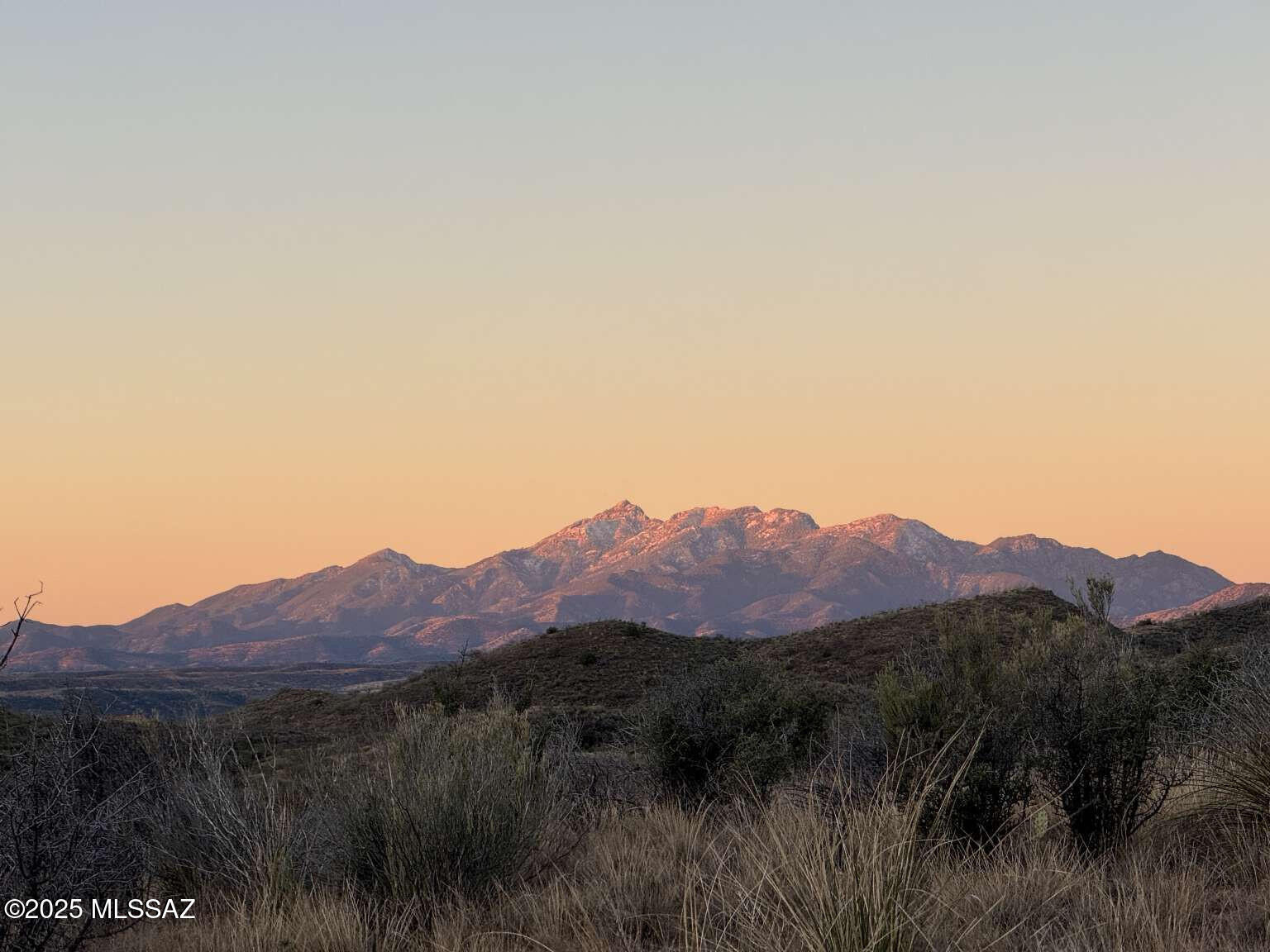 Your Arizona Dream Awaits This stunning 10.38-acre parcel offers rare direct access--by vehicle, horse, or foot--to 41,000 acres of Cienega Creek wilderness. With 470 feet of road frontage and a border on pristine BLM land, it's a perfect base for outdoor adventure. Set between 4,800 and 5,100 feet in elevation, the property provides cooler temps, panoramic mountain views, and varied terrain--ideal for a dream home or off-grid retreat. Enjoy solitude just 30 minutes from Houghton's Walmart Supercenter and the vineyards of Sonoita. The community is friendly, independent, and welcoming--offering both connection and privacy. Freshly surveyed and ready for your vision, this is a rare chance to own a piece of Arizona's wild beauty.