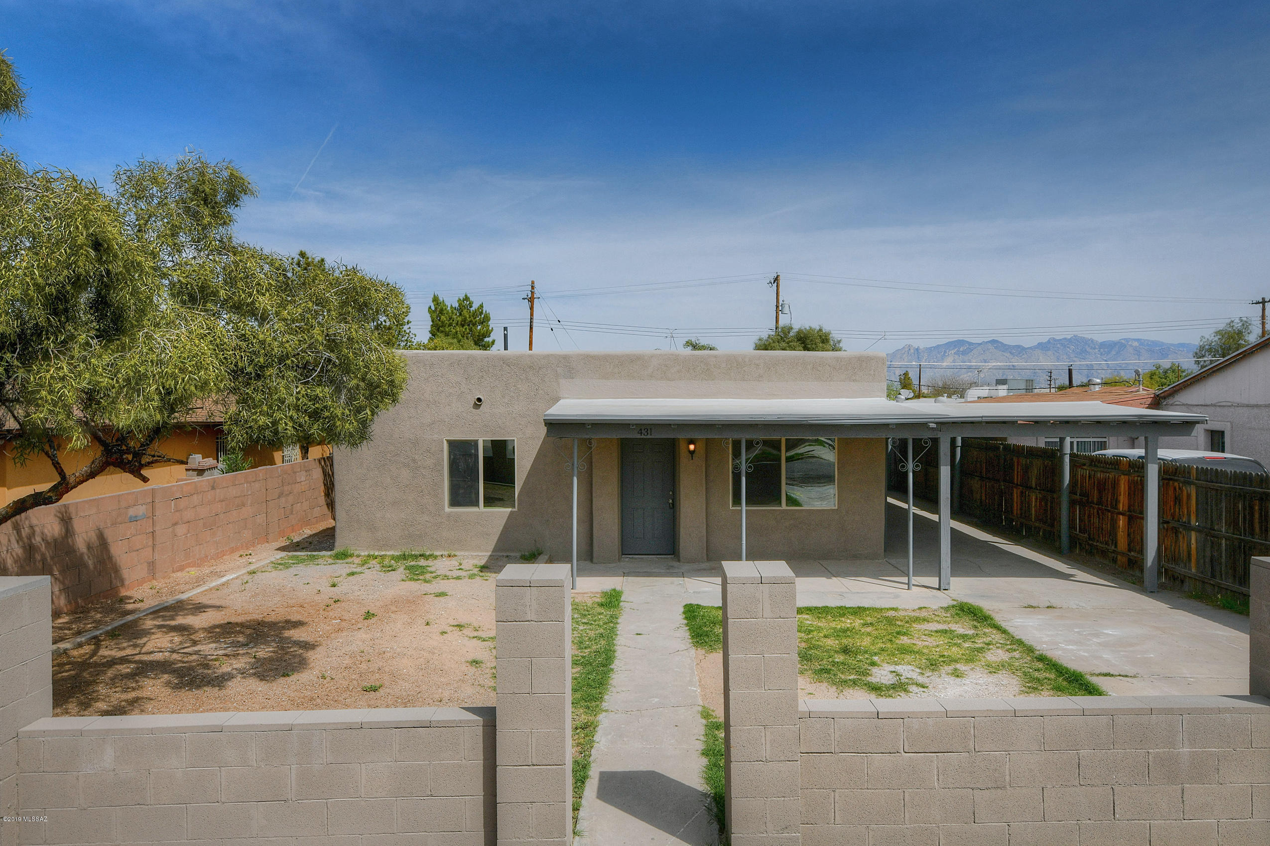 Must see beautiful cozy single family home! Located in south Tucson minutes away from I-10 , I-19 & Tucson Marketplace giving you access to family fun, shopping, restaurants & More! This charming home is a comfortable 1447 sq. ft. and it was fully permitted with the City of South Tucson. Home has brand new AC unit that blows super cold air. Highlights include two tone paint inside and outside. Kitchen has been updated March 2019 with new cabinets and beautiful Formica counter tops. There is ceramic wood looking tile & new carpet in all bedrooms. Bathroom remodeled March 2019. Don't miss out on such a stunning, turn key home!
