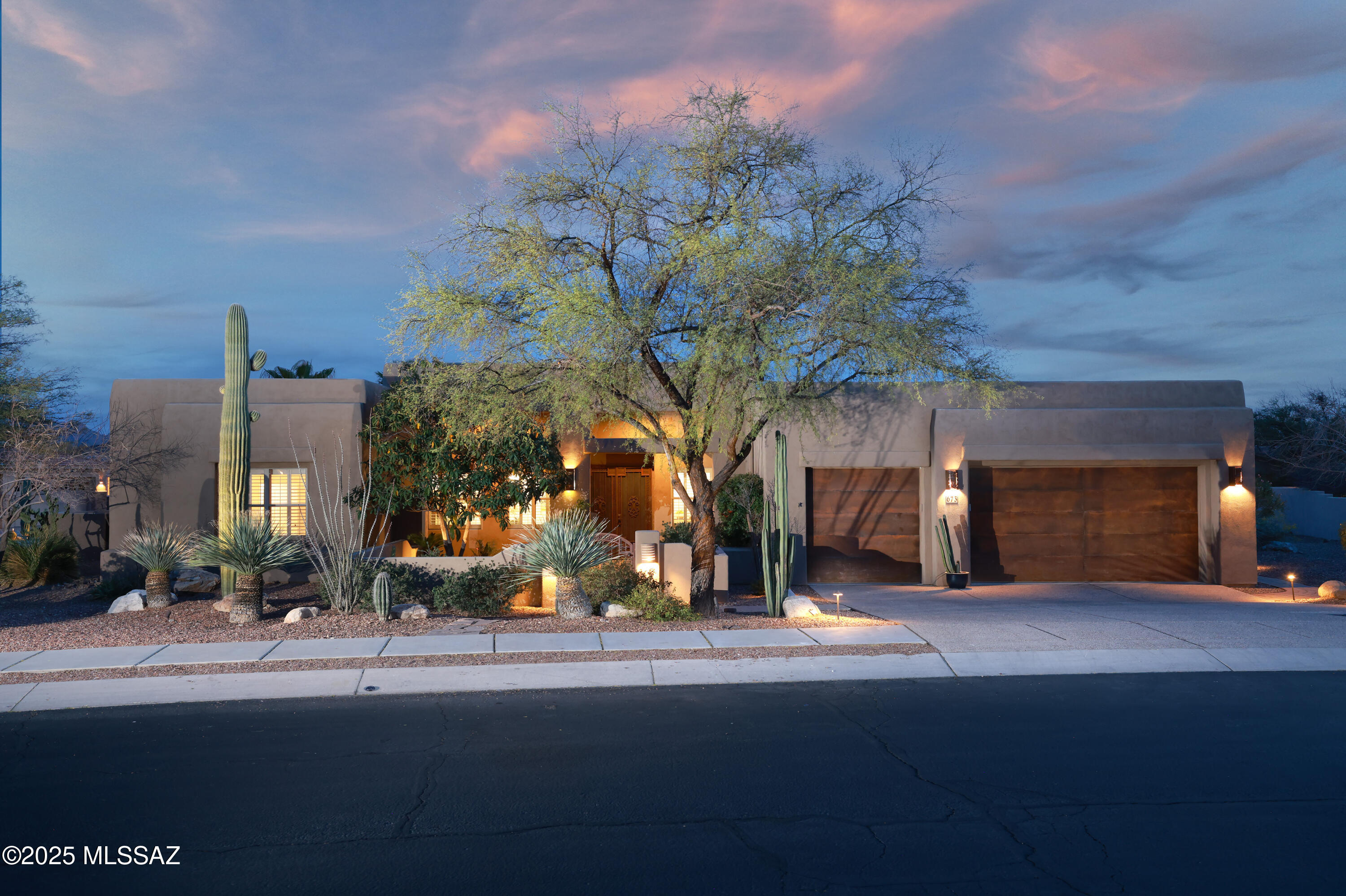 Welcome home to this beautifully renovated 4BR, 3BA gem, nestled in a peaceful and highly sought after gated community in Oro Valley.From the moment you step inside, you'll feel the care and love that has gone into every detail of this home. The spacious kitchen boasts sleek, smart LG appliances, stunning granite counters, and freshly painted cabinets, perfect for preparing meals and making memories. New carpet throughout, updated secondary bathrooms, new interior paint, new light fixtures and ceiling fans create a bright, welcoming atmosphere throughout.The heart of the home is the cozy great room with a charming fireplace, offering a warm place to relax. The bright/open floor plan also includes a lovely dining area, a den for quiet moments, and a dedicated office space for work or creativity. One of the bedrooms has private access from the charming front courtyard, offering a peaceful retreat for guests or family.
Your private sanctuary awaits in the spacious primary suite, featuring a newly updated glass shower and freshly painted cabinets in the en-suite bath, along with a luxurious jetted tub, double vanity, and a large walk-in closet. Plus, you'll have direct access to the serene backyard, where you can unwind. This split floor plan provides plenty of privacy while being perfect for family gatherings or entertaining loved ones.
Step outside into the backyard oasis, where a sparkling pool and spa invite you to relax, and a Kiva fireplace sets the stage for unforgettable evenings under the stars. The large, covered patio with electronic sunscreen offers both comfort and shade, while the breathtaking mountain views will make you feel like you're on vacation every day.
This home also features a 3-car garage with built-in storage, is situated on a private corner lot, and has been meticulously maintained by its owners, who have made it a cherished family haven. The nearby nature preserve offers a perfect place to walk, run, or bike, allowing you to truly embrace the desert beauty surrounding you. This home is ready to be filled with your own memories come see for yourself!"