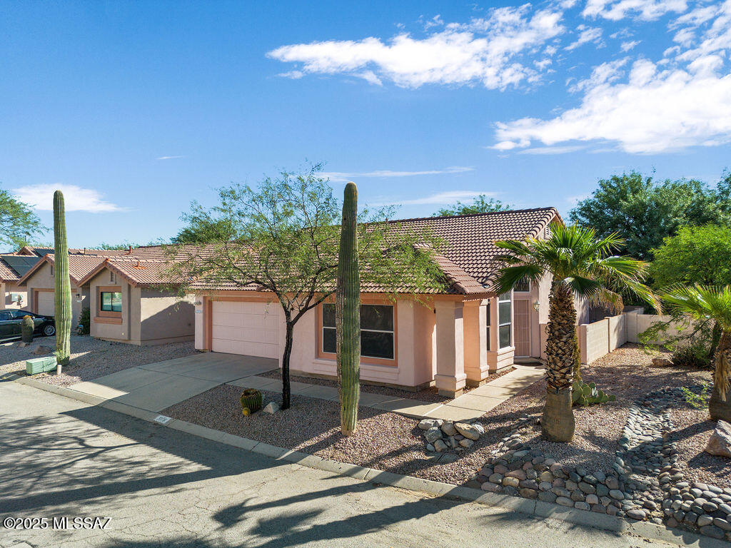 Welcome to this 1,705 sq. ft. single-story home in the sought-after North Ranch community. Offering three spacious bedrooms and two full bathrooms, the home blends comfort and privacy with a touch of desert beauty. The peaceful backyard features no rear neighbors, privacy—perfect for quiet mornings or entertaining under the Arizona sky. North Ranch is a beautiful, well-maintained neighborhood with outstanding amenities, including two sparkling community pools, relaxing spas, tennis courts, pickleball courts, scenic walking paths, and a welcoming clubhouse for gatherings and events. Ideally situated for convenience, the community provides quick access to shopping, restaurants, and everyday services, making it easy to enjoy everything the area has to offer while still coming home to a serene retreat.