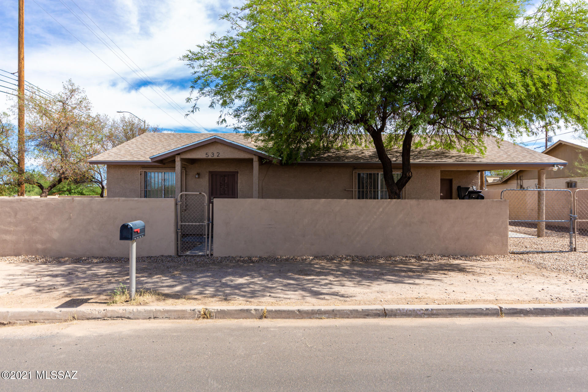 Welcome home to this beautifully remodeled 2 bedroom, 2 bathroom property on a coveted corner lot! Dramatic vaulted ceilings, delightful wood look floors t/o, upgraded lighting/ceiling fans, and open concept. Plenty of white wood kitchen cabinets, granite counters, brick backsplash, and SS appliances. The comfortable master bedroom features bountiful natural light, large walk-in closet, and an ensuite with a granite counter. Enjoy the expansive yard with shade trees that provide a nice relaxing setting. Room for a pool. Schedule a visit today!