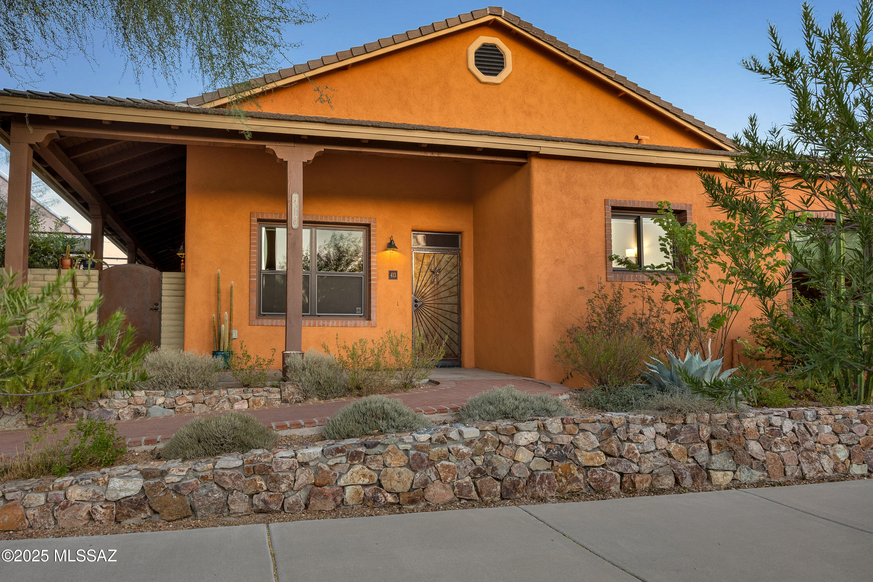 John Wesley Miller's Vision House in Armory Park del Sol is perhaps the most resource efficient home in Tucson! A thoughtfully constructed, Net Zero home using only the highest quality of materials. Open & spacious, this home offers a split floorpan with 10 foot ceilings & gorgeous natural light. Green features abound in this truly sustainable home that we should all desire to emulate... solar, EV wall charger, PV storage system, rainwater harvesting cistern, 21 SEER heat pump, tankless hwh PLUS solar hot water with 120 gallon solar hw, Energy Star appliances (Bosch & Miele), low E dual pane windows, recycled porcelain tile, recycled glass counter & on & on. This 3 bdrm, 2.5 bath home also has a 2.5 car garage perfect for tinkering/creating work spaces. Armory Park del Sol (APdS) is an award winning energy efficient community of HOMES that are universally accessible for all who are mobility challenged. The community's Ashley Park is a delightful stroll not to mention the walkability factor to all that Downtown Tucson has to offer with a WalkScore of 82 & a BikeScore of 100!  Downtown community living at it's absolute finest!