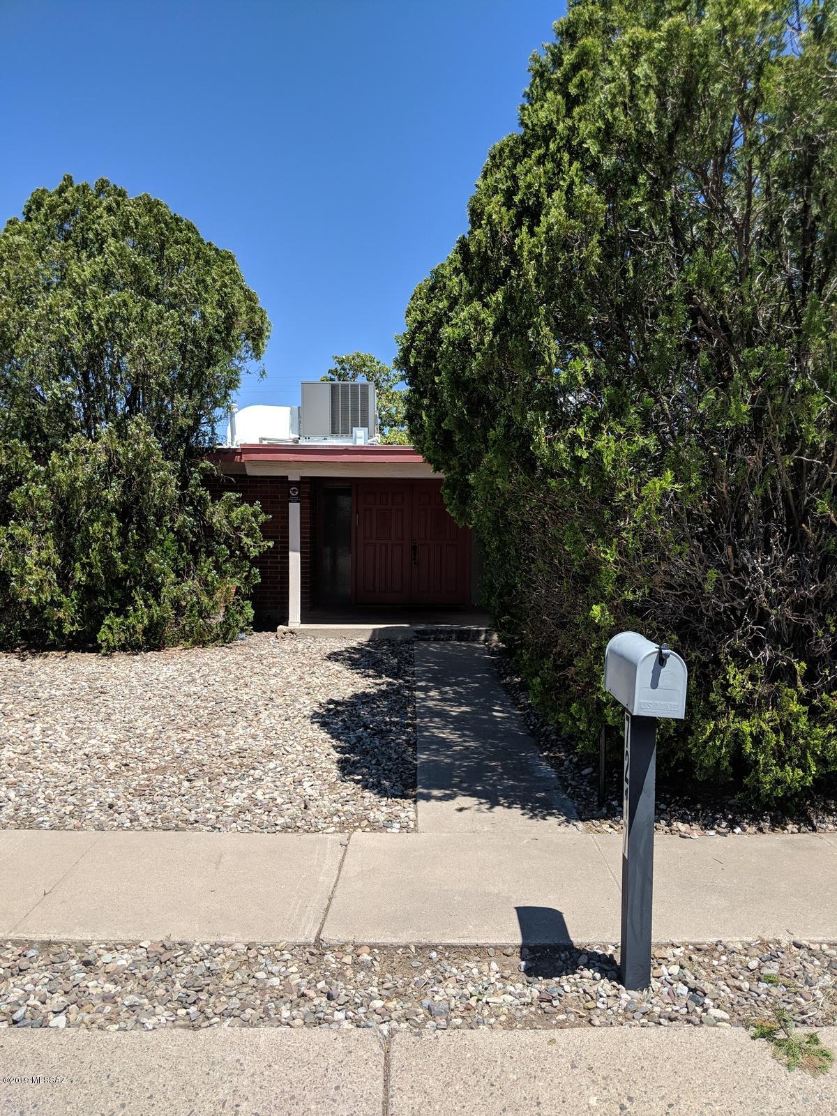 freshly painted, new carpet, 4bedroom 2 bath home turn-key ready! Newer kitchen cabinets, large open living room with fireplace, dining room area, covered patio with French doors, roof just recoated, air conditioning, amazing location with easy access to shopping, schools, restaurants, buslines, Davis-Monthan AFB.