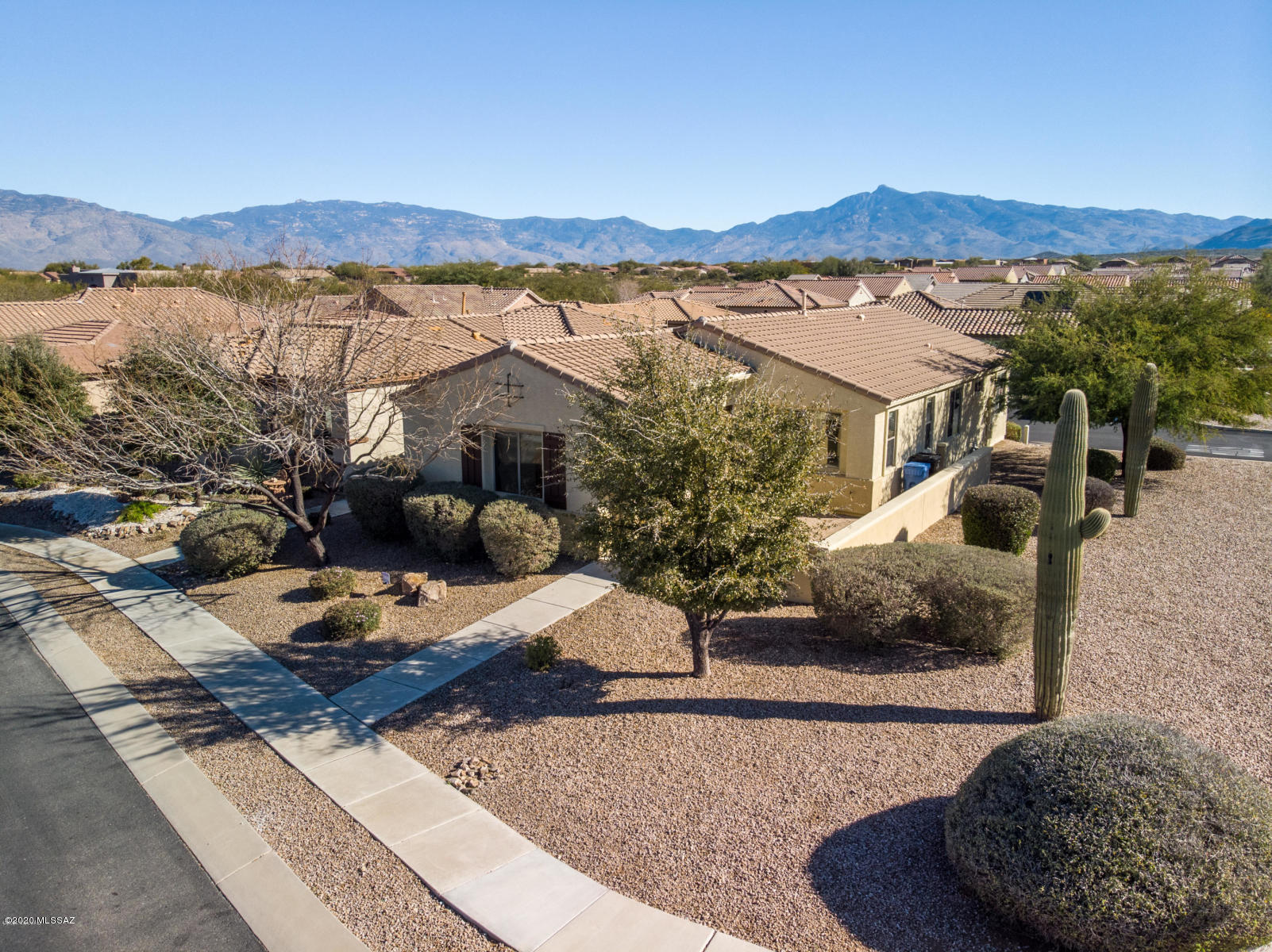 Active Adult Living at its finest!! This gem features a spacious courtyard, FRESH exterior and interior paint, brand new carpet in both bedrooms, wide open kitchen with solid surface countertops, a plethora of cabinets, walk in pantry, ceiling fans, generous use of recessed lighting all on a coveted corner homesite. Two car garage includes opener and cabinets for storage. All appliances included. Del Webb is a wonderful community with MANY amenities, friendly neighbors, activities, sidewalks throughout the community as well as gated access. Also listed for sale, MLS#22002343 whatever happens first!