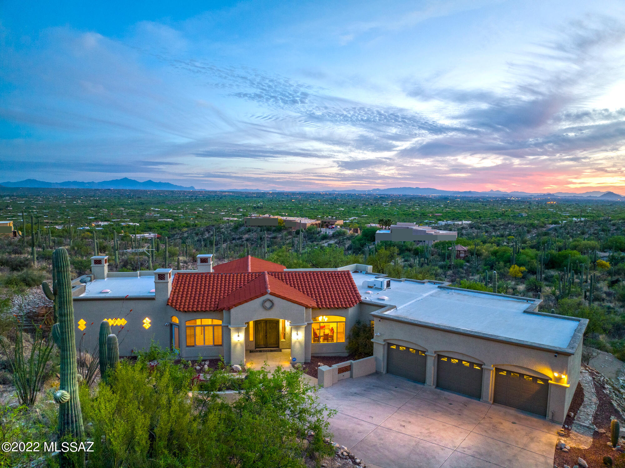 Welcome to your personal retreat perched high above the city. From the moment you arrive you will understand why this coveted location is rarely available. This custom home was designed to embrace the breathtaking mountain & city views from every window. Featuring 3,167 sf of living space including 3 bedrooms plus a den. Boasting exquisite details such as tongue and groove cathedral ceilings, exposed beams, multiple fireplaces & tile throughout the home. The covered patio space extends the living area outdoors. With an extended 3 car garage and workshop area there is ample space for hobby items. The primary bedroom is truly an escape; featuring a sitting area complete w/ fireplace, 2 large walk-in closets, jetted tub and separate vanities.