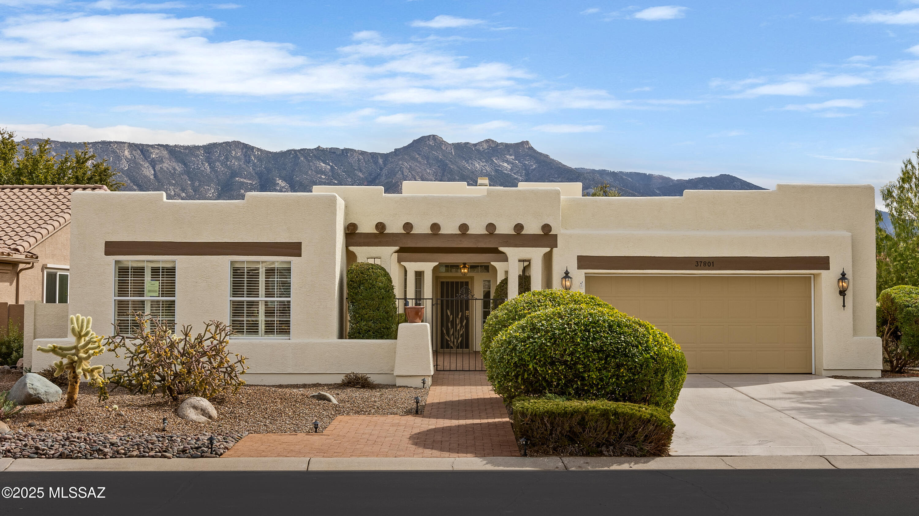 Welcome to SaddleBrooke HOA One, southern Arizona's premier active adult resort community nestled in the foothills of the stunning Santa Catalina Mountains. This exquisite Estancia model offers a harmonious blend of luxury and comfort. The main residence features two spacious bedrooms and two bathrooms. Additionally, there's a private guest casita with a full bath and separate entrance, perfect for guests or as an art studio. The kitchen boasts granite countertops, ample cabinetry, & modern appliances, ideal for culinary enthusiasts. Living spaces include a cozy living room with a fireplace and a separate family room adjacent to the kitchen, providing versatile areas for relaxation and entertainment. Outdoor living is enhanced with screened in back patio w/mountain views .