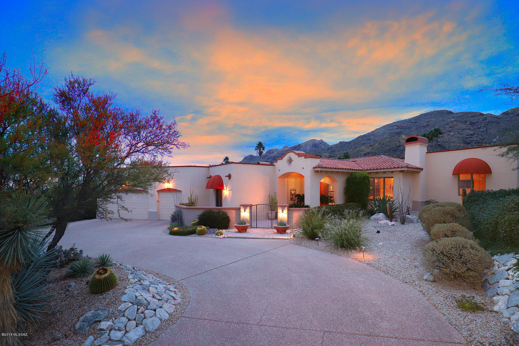 LOCATION,LOCATION,LOCATION...3202 E. Blossom Dancer Ln. sited on cul-de-sac lot in the exclusive guard gated community of Cobblestone is now available for the discerning Buyer. Enter this Mediterranean home through paver courtyard to foyer that showcases unobstructed breathtaking mountain views.  Spacious floor plan opens to living room/dining room w/vaulted ceilings & abundant natural light.  Family room w/FP off gourmet kitchen w/all SS appliances is the perfect setting to entertain.  Master Suite boasts private door to patio w/mountain views, shower,jetted tub & generous walk-in closet.  Resort style, lushly landscaped backyard w/pool/spa, built-in BBQ,covered patio,& beehive FP, creates spaces to relax with family and friends. A+ location within minutes away from La Encantada.