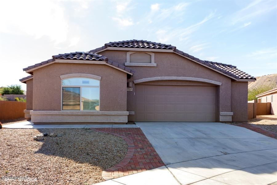 This is a Fannie Mae HomePath property. Built in 2012. With 1704 sq ft of living space this home has 2 bedrooms, 2 bathrooms, plus den, beautiful rich brown wood look tile flooring throughout, kitchen with plenty of cabinet space, granite counter tops, breakfast bar/island, & dining area. Backyard with covered patio & pool great for entertaining. <FONT COLOR=RED>Recently painted interior with two tone paint, & installed NEW kitchen appliances. </FONT>
Part of Green Valley Recreation where there is always something to do. GV Rec membership provides 14 centers with pools, spas, exercise equipment, sport courts (tennis-pickleball-raquetball-basketball-shuffleboard), movies, lectures & more. It offers classes in art, music, sports, dance, games, photography, tours, hiking, computers, etc. Located close to I-19, shopping, restaurants, and much more! Attention Owner Occupants Buyers, incentives are now available on this property! Request up to 3% closing cost assistance,  ask Agent for more details, restrictions apply.