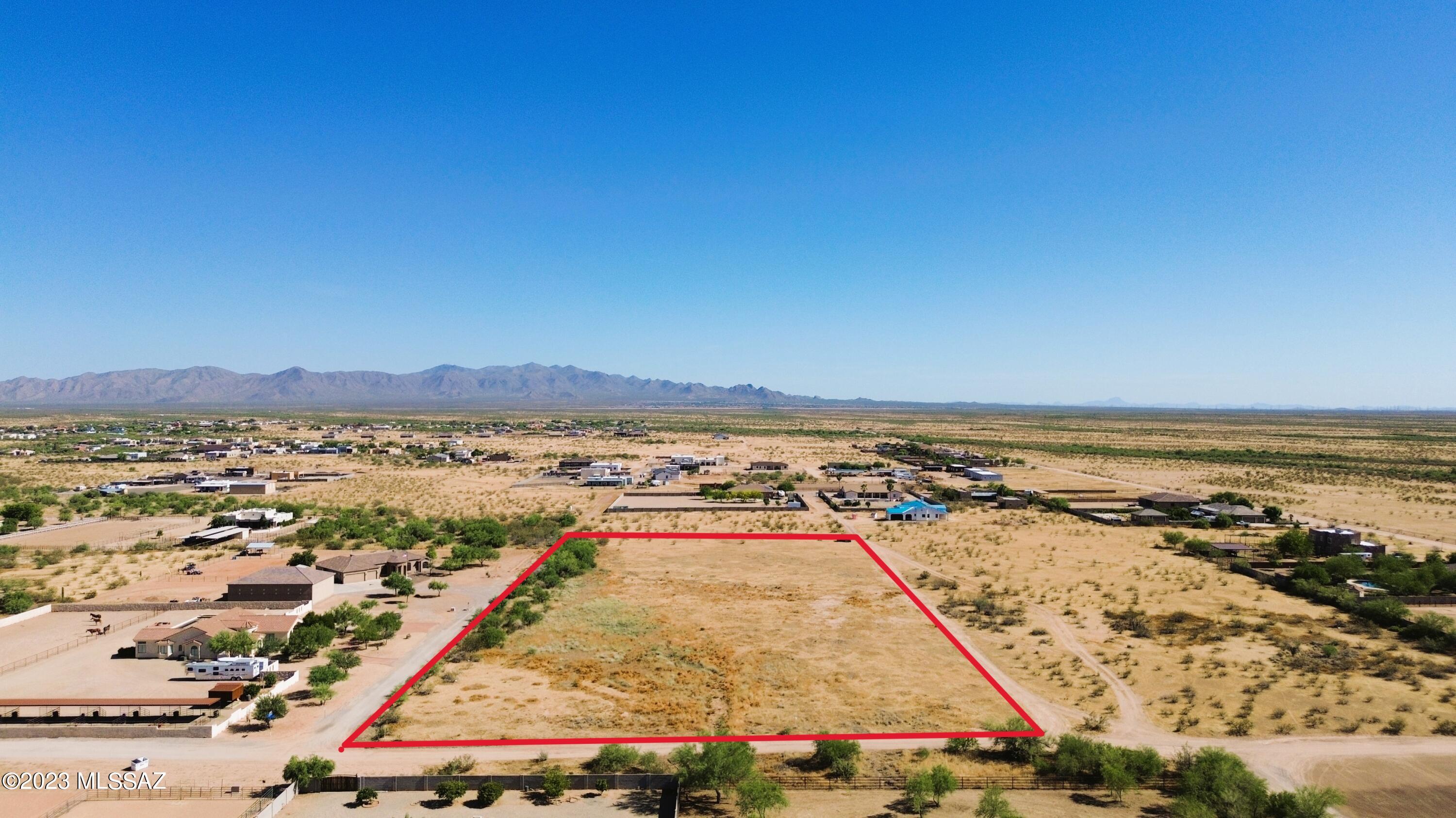 +/- 5 ACRES IN WITTMANN AZ! THESE FLAT 5 ACRES WILL MAKE A GREAT COUNTRY CUSTOM EQUESTRIAN HOMESITE. BUILD YOUR DREAM CUSTOM HOME AND PUT YOUR HORSE PENS, TRAINING RINGS AND ARENA THERE TOO! SURROUNDED BY BEAUTIFUL CUSTOM HOMES AND LARGE EQUESTRIAN ESTATES. ZONED R-43 in MARICOPA COUNTY. POWER IS LOCATED ONSITE.  POSSIBLE WELL SHARE TOO. SEE VIRTUAL TOUR FOR A BIRD'S EYE VIEW.
