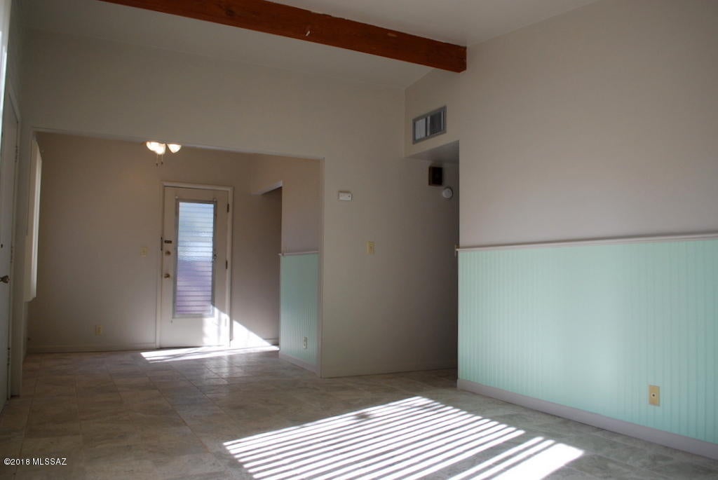Good Sized 1 Bed 1 Bath in Small Mid Century Midtown Complex. Miramonte Park Neighborhood and Right on 3rd St Bike Path. 585 SQ FT and tons of vintage character. Remodeled recently with new tile floors, paint, wainscoting walls in living room and bedroom.  Private entry with front yard space and big tree that provides some shade. Living area with vaulted wood beam ceiling and separate dining nook. Kitchen has original  floor to ceiling hardwood cabinets, full size fridge and gas stove. Bedroom has ceiling fan.  Full bath with vintage pastel tile and lots of cabinet space. Off street parking. Central A/C & Heat. On site laundry. Water/sewer/trash included in rent price. This home is offered as NON-SMOKING. Owner will consider CATS but NO DOGS will be allowed.