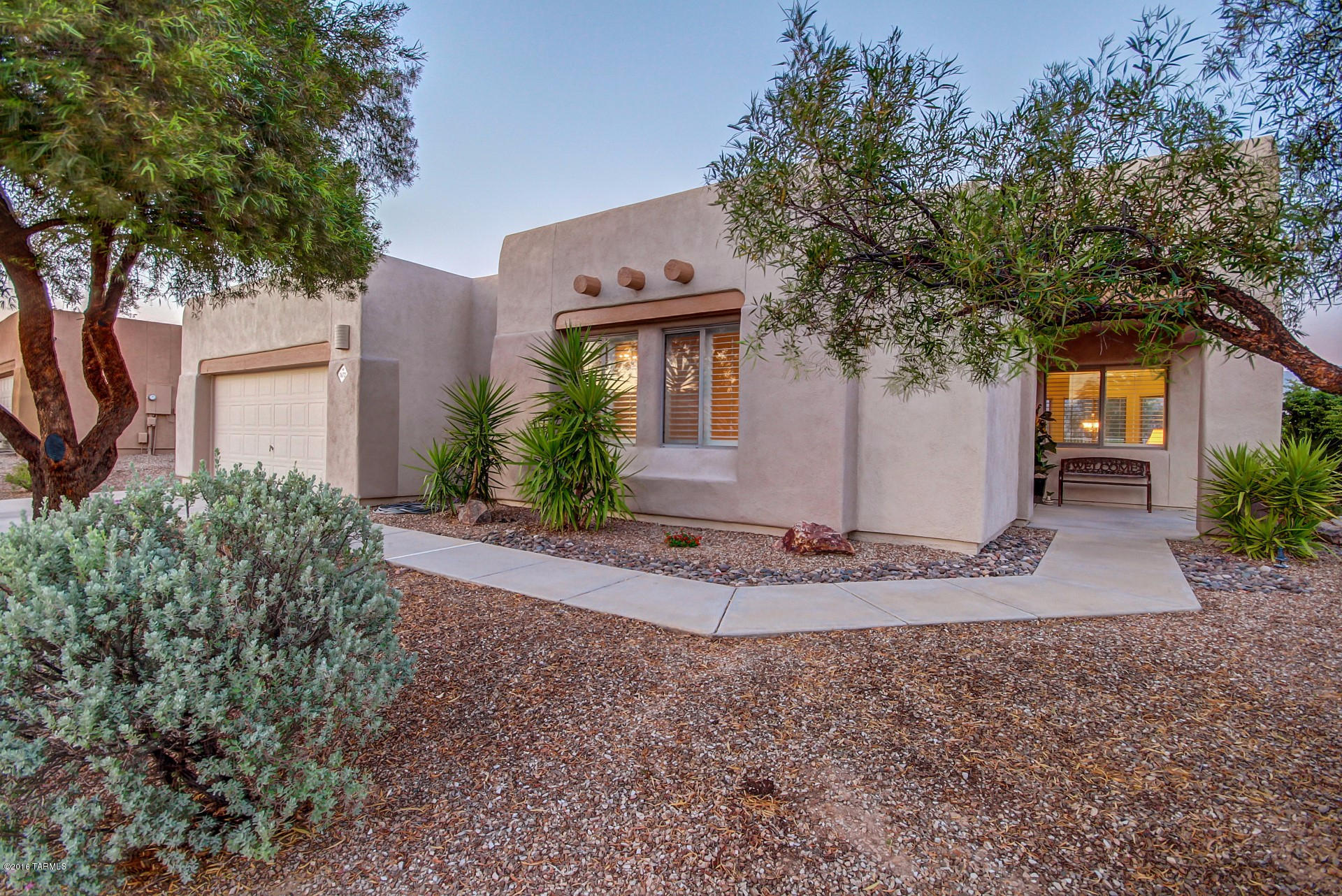 Looking for Oro Valley spectacular views? Move-in ready? Contemporary design? Rare find in Monterra Hills with east-facing backyard, original owners who never had pets, well maintained, 3 bedroom, 2 baths, 2011 square feet with panoramic Catalina Mountain views and 10' ceilings. This home is truly move-in ready with new paint throughout, new carpet, large tile, new range, new Trane air conditioner and furnace in 2014, granite tile counters, shutters, installed alarm system, and covered patio. Master suite has garden tub, separate shower, double sinks and large walk-in closet plus remote-controlled window shades over garden tub as well as skylight. Ceiling fans throughout plus custom cabinets in garage giving you huge storage capacity. Check it out ASAP!
