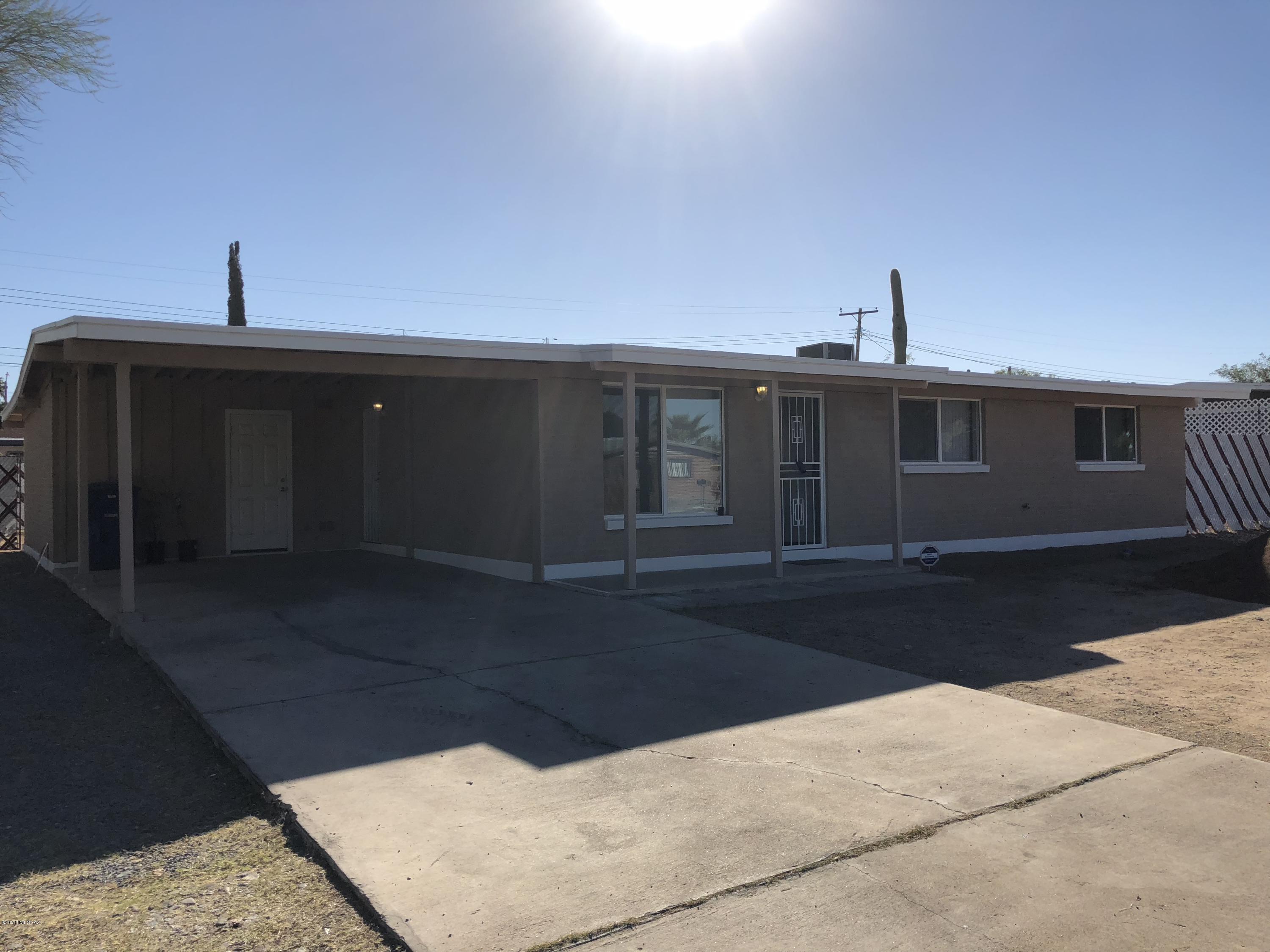 Beautifully maintained property.  Roof was just coated, house was just painted inside and out, bedrooms just carpeted.  Pride of ownership here!  Corner lot!!!  Big back yard with lost of potential.  Newly landscaped front yard.