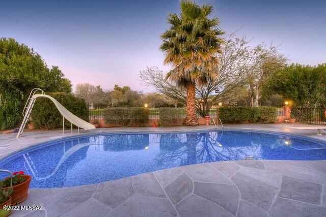 Remarkable 4127 square foot home on the 8th green in prestigious Forty Niner Country Club Estates. Beautifully updated and well-maintained with 4 Bedrooms 4 Full Bathrooms and a Master Suite at each end. Kitchen has quartz counters with large breakfast bar, stainless steel appliances and plenty of cabinet storage. Elegant gas fireplace in great room and wood plank tile flooring throughout the living areas. Entertain in the formal dining room or retreat to your private office/den with patio access. Enjoy the beautiful mountain & golf course views from your gorgeous backyard complete w/massive covered patio, unique mosaic bubble tiled pool and newly refinished pool decking. Additional Features include tv/bonus room, 2 work rooms for hobbies or crafts and a large 3-Car garage.
Owner/Agent