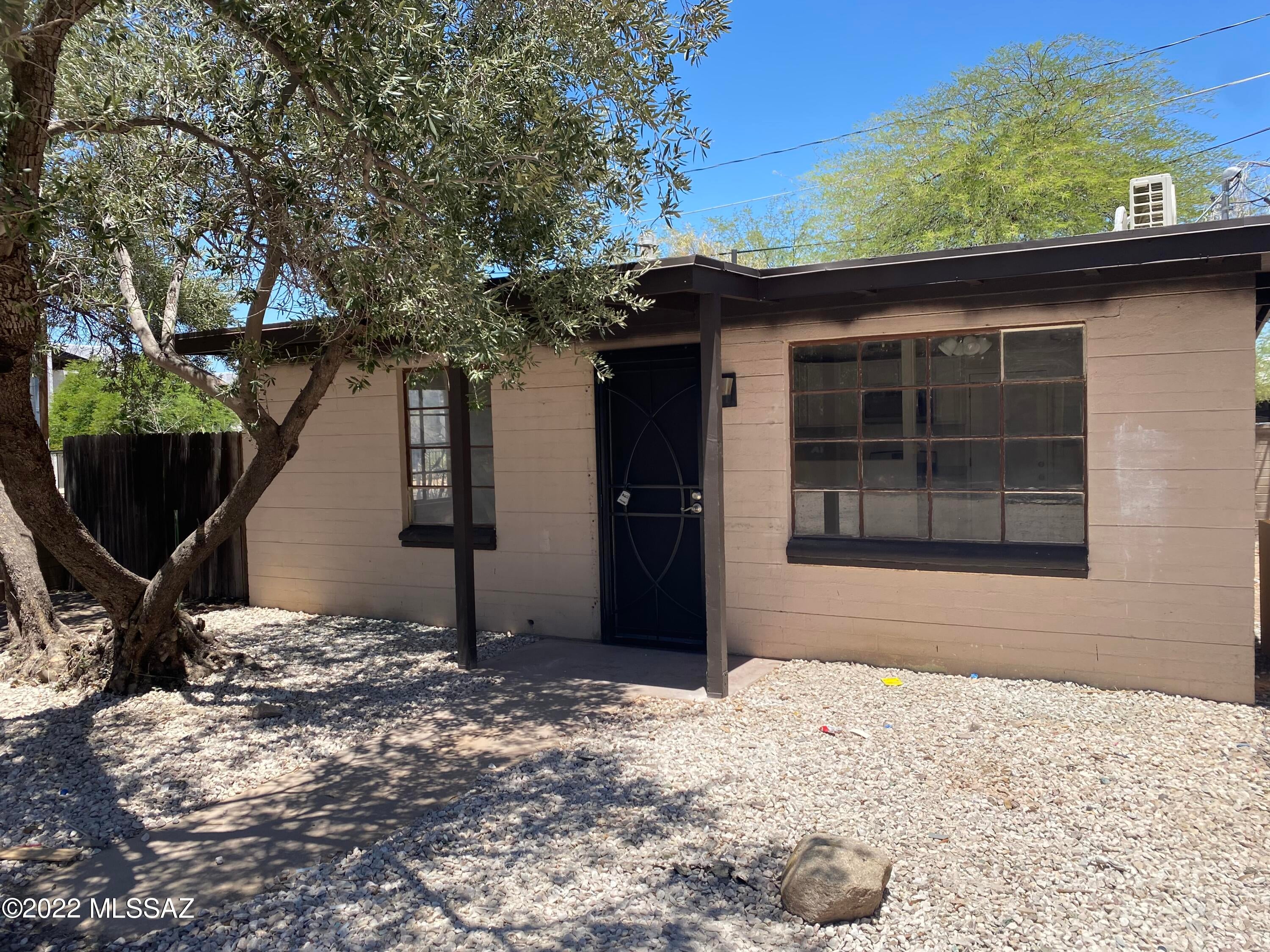Recently remodeled 1 bed 1 bath bungalow. This move in ready gem offers new mini splits, ceramic tile throughout, new kitchen cabinets and stainless steel appliances, built in microwave,  large walk in closet Washer dryer hookup, Enclosed yard. Close to Grocery stores, shops, and bus line. Minutes to Downtown and I-10. Rent includes water, trash and sewer Please call or Text Angie 520-331-1194