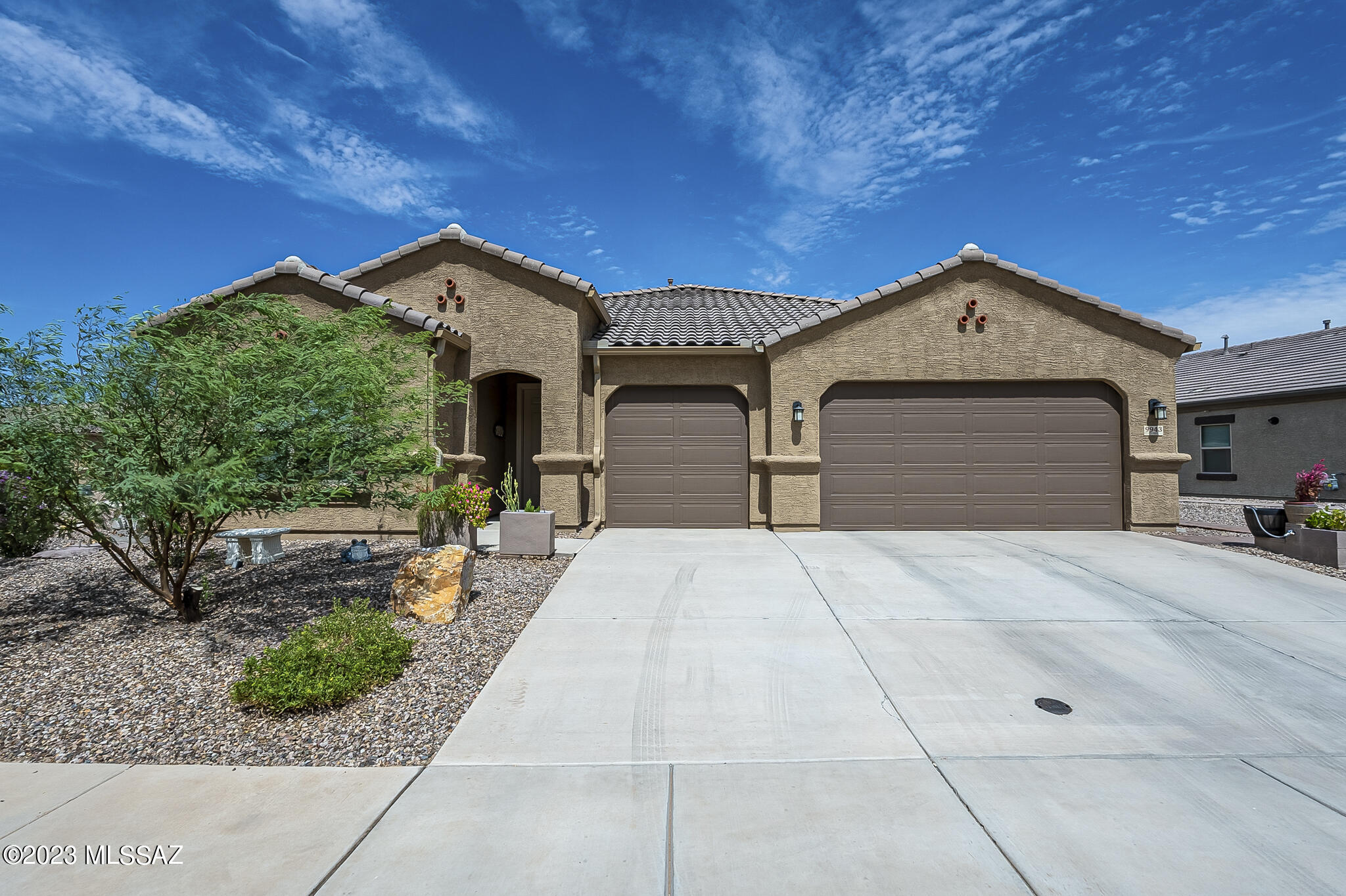 New Price! This well maintained home shows like brand new, 3 Car Extended Garage, 4Bd, 3 full baths, 2,253 SqFt., High Ceilings, Great Room concept off large eat in Kitchen, Beautiful White Cabinetry, Quartz Countertops, Stainless Appliances, Gas Cooktop, Convection Oven, Breakfast Bar plus Eat in Nook. Living room with walk out patio, Bonus den could be used for formal dining or additional sitting/TV Room. Private, large Master Suite & Bathroom, soaking tub, shower, large master closet. Separate 2nd and 3rd Bedrooms share full bath. 4th Bedroom plus full guest bath down separate hallway. Generous laundry area. 240vlt hookup, epoxy floors in garage. Luxury tile throughout. Close to I-10 and many amenities. 2 Neighborhood Pools, Community Parks, Sport Courts.