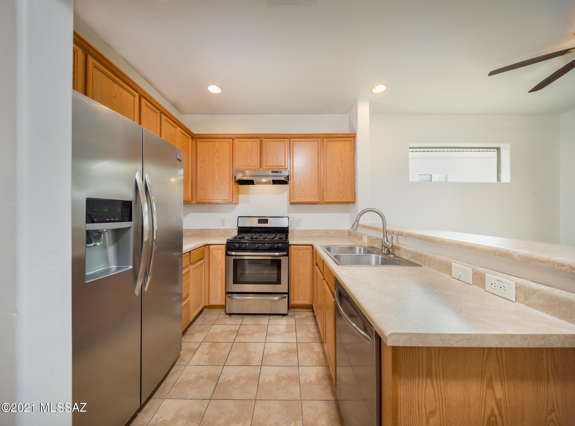 Fresh Interior & Exterior Paint with New Carpet | 3 Bed - 2 Full Bath and 1 Half Bath | 1702 Sq. ft. | 2 Car garage - Updated and Move-In Ready with Views. Sparking kitchen offers stainless appliances, an abundance of cabinetry & counter space, pantry, and breakfast bar seating. Relax in the family room that accommodates large furniture. Spacious master suite with double sink vanity bath and walk-in closet. Landscaped, easy care yard with mountain and open-space views. Desirable neighborhood with close by park, featuring a basketball hoop, play sets and picnic ramada. Close access to I-10, Davis-Monthan AFB, Houghton corridor shopping and dining. Award Winning Vail School District  This Home Will Not Last!