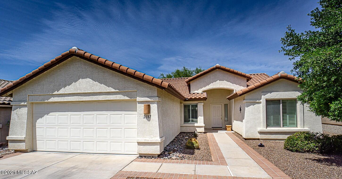Even before you enter this Quail Creek home, you'll be impressed by the freshly painted exterior. Once inside, the brand new kitchen appliances (April 2021) in beautiful black stainless will WOW you!  The large eat-in kitchen also features quartz countertops. Popular Oakmont model with 2 BR + 2 Bath + Den is perfect size at 1569 sq ft. with split bedroom layout. Warm ceramic tile in main living areas with neutral carpets in bedrooms and Den. Plantation shutters throughout the home, offers style and privacy. Other recent updates include new roof in 2019, new water heater 2020 and a water conditioner.  Ideal location in the gated community of Quail Creek in close proximity to Resort Amenities.