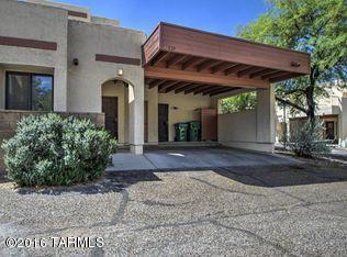 Charming Home – Convenient Location!  This home is a must see, tucked away in a quiet community just minutes from shopping, restaurants and more.  Delightful kitchen features recycled glass countertops with separate entrance from outside.  The main level highlights beautiful Saltillo tile and exquisite double French doors that lead to private patio with built-in BBQ perfect for entertaining!  With a balcony just at the top of the stairs you will enjoy breathtaking mountain views.  Large master bedroom awaits you with double closets and private balcony ideal for relaxing.  This picture-perfect home has something to offer everyone, come see it today before it’s gone!