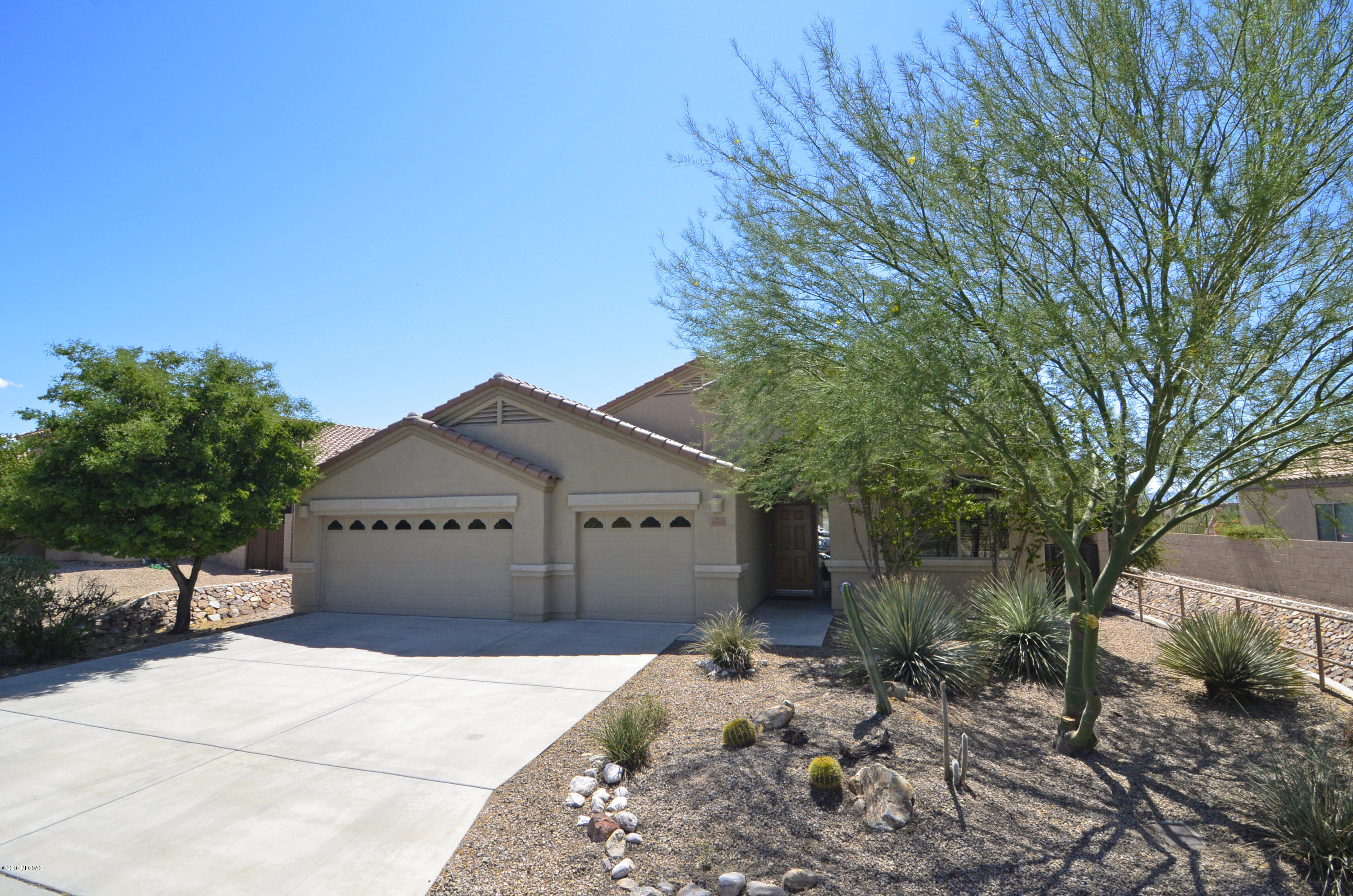 Wonderful Preserve at Dove Mountain Home in a Private Setting Backing to Open Space. Chef's Kitchen with Slab Granite Counters, Stainless Appliances, French Door Refrigerator, Gas Range, Center Island, Breakfast Bar, Pull-out Drawers & Pantry. Bright Dining Area & Open Family Room. Living & Dining Rooms for Entertaining. Spacious Master Suite with Huge Walk-in Closet. Elegant Master Bath with Soaking Tub, Separate Shower & Double Sink Vanity. Laundry Room. Extended 3-Car Garage. Fabulous Outdoor Living Space with Shady Covered Porch, Extended Patio, Relaxing Spa, Fountain, Professional Landscaping & Fenced-in Pet Friendly Yard. New Carpet & Fresh Paint. Meticulous Move-in Condition.