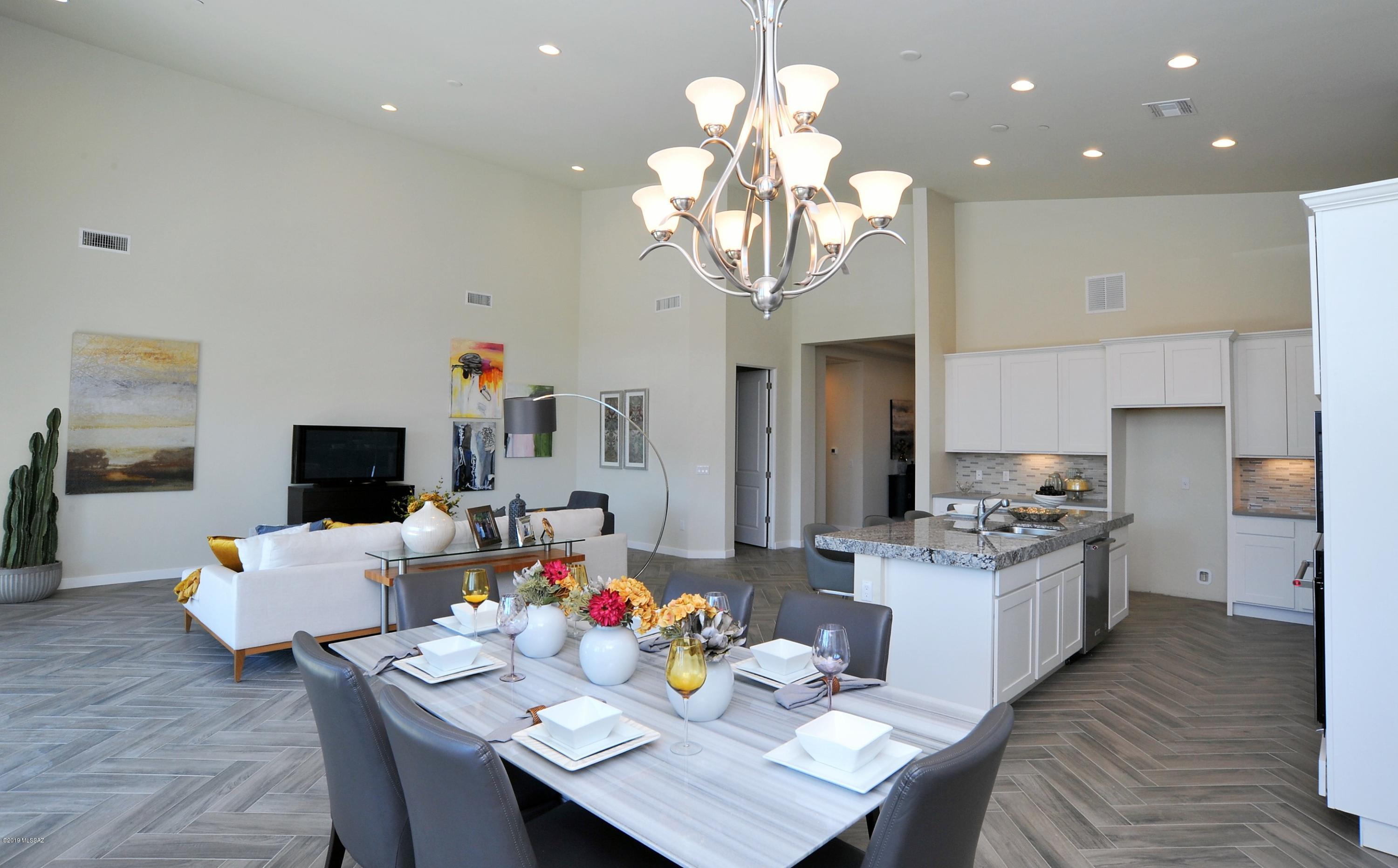 This home is part of a 12 home gated community in The Historic Sam Hughes Neighborhood.
Enjoy gatherings in a generously-sized living/dining area .Masterful design & modern luxury are uniquely embodied in this open contemporary 2 bed,Den, 2 & 1/2 ba home.Kitchen includes quartz & granite counter tops, Kitchen-aid stainless steel appliances,breakfast island & 42'' white upper cabinets w crown molding. Sprawling entertaining spaces flow outside to the outdoor living space.
The master bedrm, complete with sitting area, double walk-in closets & luxurious ensuite featuring free standing tub & large walk-in shower.Over $35,000 in Upgraded interior finishes have been selected by our professions designer . These finishes plus an additional $15,000 in already added items are included at No charge