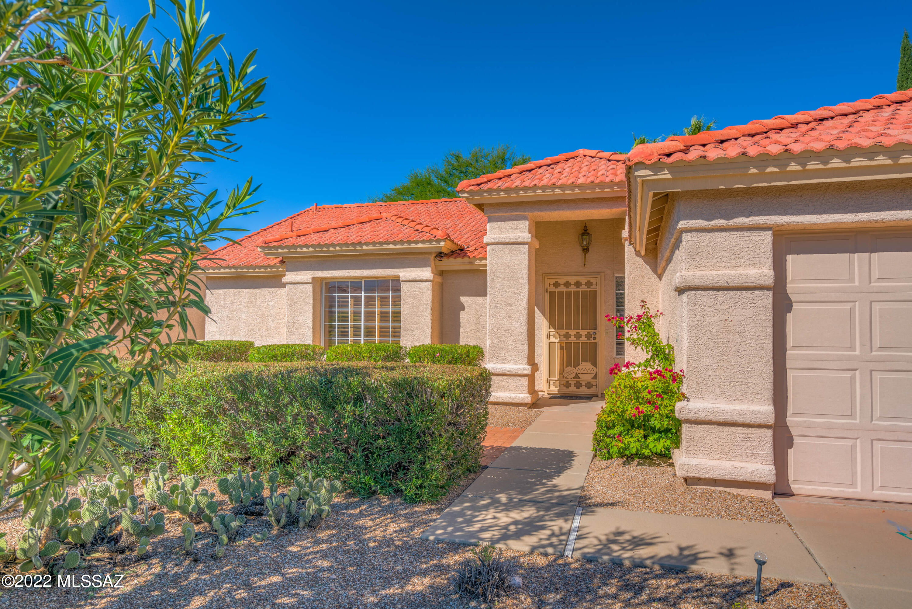 Sonora Model 2 bedroom 2 baths. Front patio has very nice mountain views. Large lot backs up to extensive green belt. Very Private back yard with shrubs and trees. Great Room Floor plan with guest bedroom and master bedroom with walk in closet. 2 car garage with storage cabinets. Needs some updating. Buyer to pay $2,732.00 Capital improvement fee Fountain convey as is.