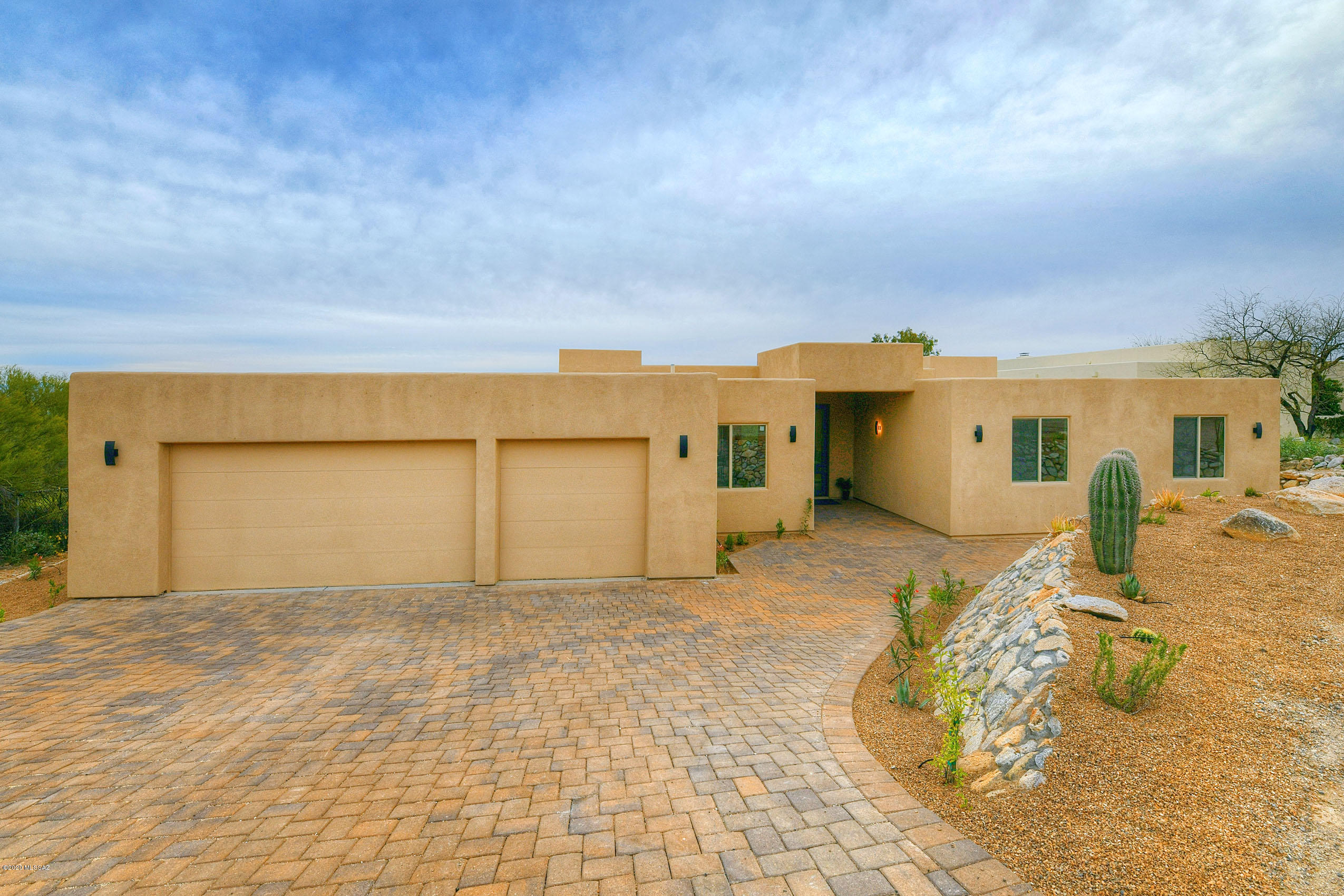 Stunning contemporary elegance with privacy and unobstructed city and mountain views. No expenses sparred in this well deigned , well thought out floor plan. Too many upgrades and features to list. Come take a peek at this brand new home today before it's too late! WONT last long!