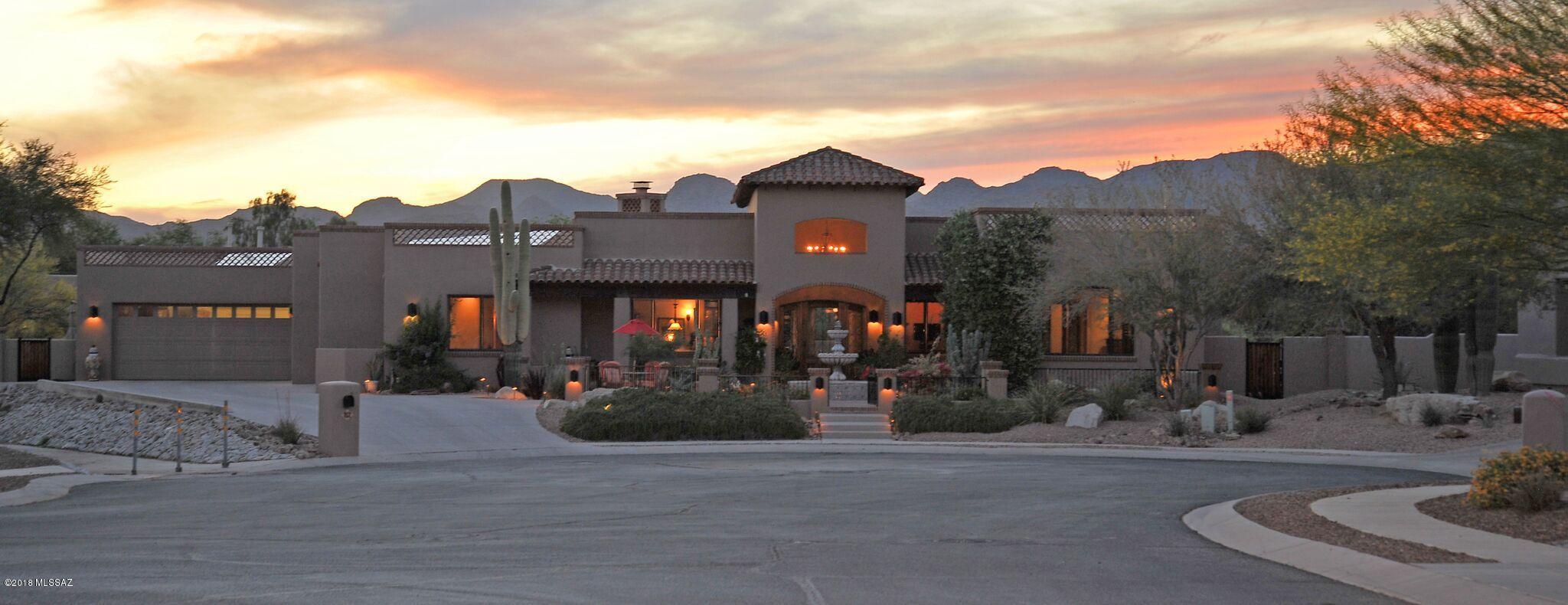 HUGE PRICE REDUCTION! No detail overlooked in this stunning custom built Spanish Territorial. Quality crafted and one of a kind touches make this home truly unparalleled. Block construction, real Mexico made tile chinked roof with scalloped clay roof detail. Knotty Alder front doors greet you in grand style. Imperial plaster walls on interior, cantera details flow throughout the home. Highlights include honed granite countertops, antique furniture pieces for bathroom vanities, custom cabinetry, walk in closets in all bedrooms, porcelain switch plates, inlaid carved wood features, wood shutters, casement wood stained windows. Premium Viking appliances with 6 burner range, double ovens, built in XL fridge and freezer, 2 prep sinks, pot filler, walk in pantry, custom shelving and cabinets. Did I mention that the solar panels are owned? Low Low Low electric bills!
