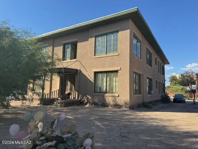 LOCATION, LOCATION, LOCATION!!! This historic 4 plex in the heart of Buells Addition a stone's throw from the University of Arizona campus.  Each unit has high ceilings wood floors, 2 bedroom and 1 bath units, with charming kitchens and bathrooms.  Plenty of room for parking.