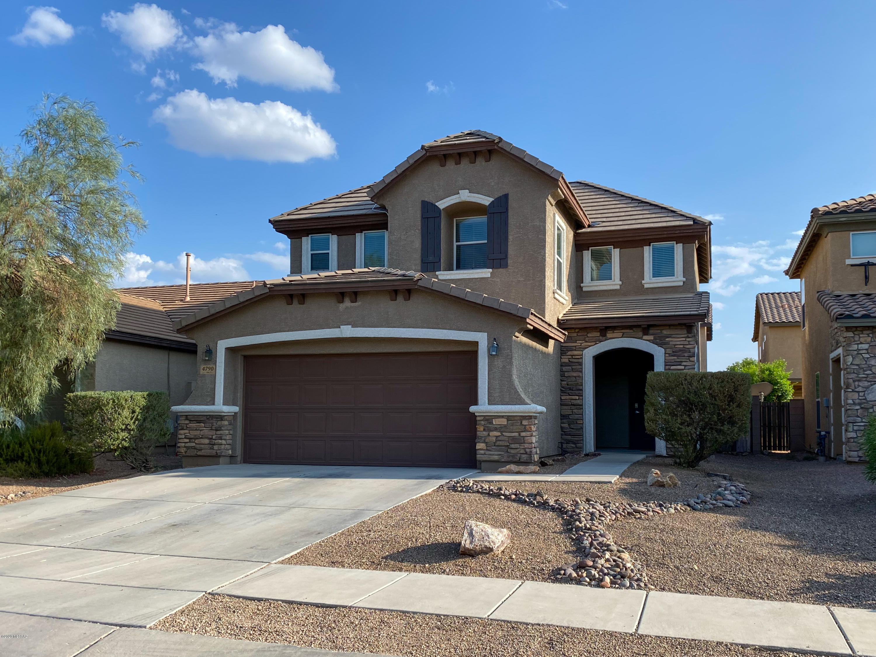 Charming, well maintained Tucson home near I-10, Tucson International Airport. Eat-In kitchen opens to the living room and features custom cabinetry, and breakfast bar. Three spacious bedrooms upstairs highlighted by the Master which includes a walk in closet and an adjoining bath. The backyard features spacious and low maintenance landscaping. This home will not last long!