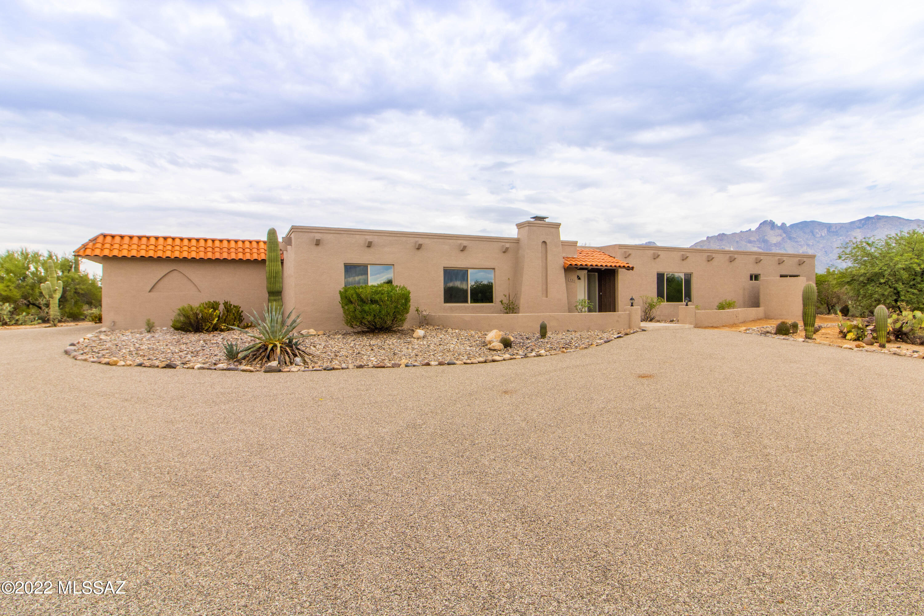 Seller will accept or counter offers from $849,900- $859,900. SELLER WILL OFFER UP TO 10K OF SELLER CONCESSION TOWARDS CLOSING COST OR INTEREST RATE BUY DOWN WITH APPROVED OFFER. Luxurious remodeled home awaits in highly sought-after Catalina Foothills! 4 bedrooms, 3 bath home with expansive floor plan for comfortable living. Cozy up near either gas fireplace in the great rooms during the cool winter nights. The gourmet kitchen features new: SS appliances, an abundance of modern cabinets, quartz countertops, farmhouse sink, and elegant gold fixtures throughout. The bedrooms are all generous in size with great closet space. Step outside into your backyard paradise. Enjoy gatherings under the extended cover patio that is perfect for entertaining. Take a splash in the newly plastered sparkling pool! The driveway has been newly chip sealed and leads to the spacious garage. Owner is a licensed agent.