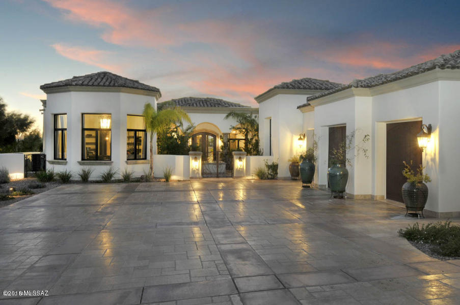 Offering the warmth & tradition of Mediterranean-style architecture, with a strikingly sophisticated & thoughtful interior design, this 4BR/6BA home built in 2009 is an absolute standout! On over 1.5 acres w/sweeping city & mtn. views, offering the ideal floor plan for entertaining or everyday living. Features include: lush courtyard entrance, travertine tile & hand distressed wood floors, gourmet kitchen w/Sub-Zero, Wolf, & Bosch appliances, granite & marble counters, alder cabinetry, butlers pantry/bar, wine room,stylish library, spacious master suite & bath, steam room,sparkling pool & spa,gated driveway,travertine motor court & 3 bay garage,  Timeless in style and positively addicting, this home does not disappoint!