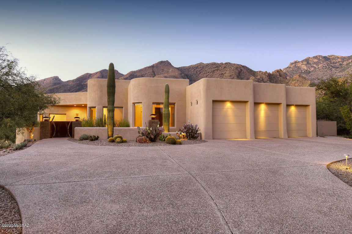 Stunning 4 BR/4BA Contemporary in Alta Vista Estates next to Ventana Canyon with up close views of the Santa Catalina Mtns. Very private 1 acre lot. Gated courtyard entry, open plan with huge picture windows, scored concrete floors throughout, chefs gourmet kitchen w/Dacor appliances opens to family room and patio doors to incredible backyard perfect for entertaining with full outdoor kitchen. Pebble tec pool with spa and waterfall. Split plan with master & office on one side and 2 ensuite bedrooms on other side..perfect for teens and guests.
Tons of upgrades since purchased.. see list in documents tab. Another Diamond in the Desert.