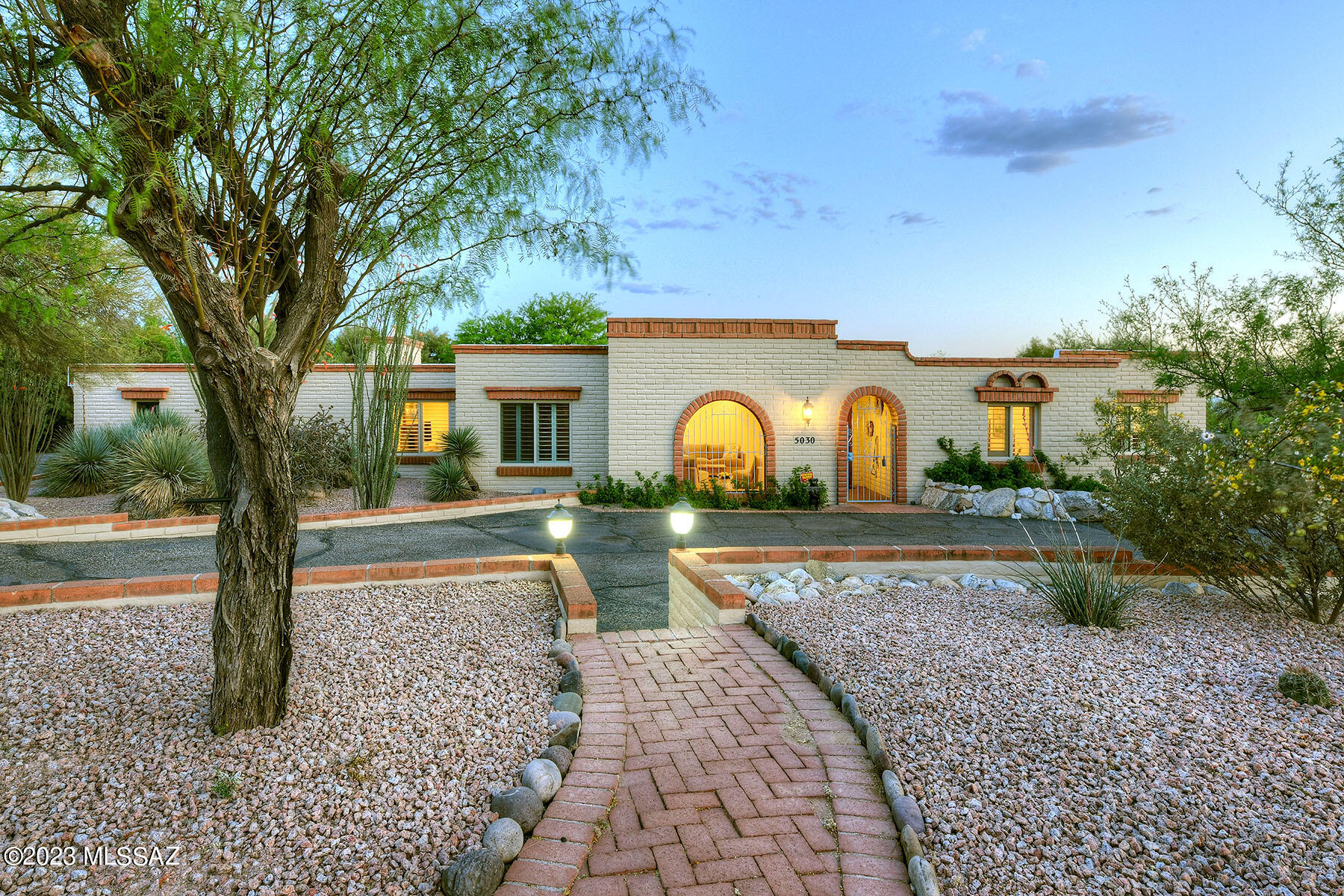 A CIRCULAR DRIVEWAY WELCOMES YOU TO THIS CHARMING BURNT ADOBE ON A CORNER LOT IN SKYLINE BEL AIR ESTATES.  THE 5BR/3BA PROPERTY FEATURES A LOVELY LIVING ROOM, SPACIOUS FAMILY ROOM W/GAS FP & BUILT-INS, ENJOY COOKING IN THE LARGE KITCHEN W/ ADJACENT BREAKFAST ROOM, TONS OF CABINETS, WINE RACK, STAINLESS STEEL APPLIANCES AND CUSTOM LIGHTING. THE MASTER SUITE FEATURES AN UPDATED BATH W/DUAL VANITIES, JACUZZI TUB & CUSTOM WALK-IN SHOWER. THE ADOBE WAS RECENTLY SEALED AND PAINTED.  ENJOY THE HUGE OUTDOOR SPACE W/MATURE LANDSCAPING, COVERED PATIO & COZY SITTING AREA W/KIVA FP.  3-CAR GARAGE W/ LOTS OF STORAGE SPACE AND LARGE DRIVEWAY FOR EXTRA PARKING. A 14 SEER HIGH EFFICIENCY SPLIT SYSTEM A/C,  SKYLINE BEL AIR HAS A COMMUNITY POOL W/SWIM TEAM, TENNIS COURTS, AND REC CENTER.