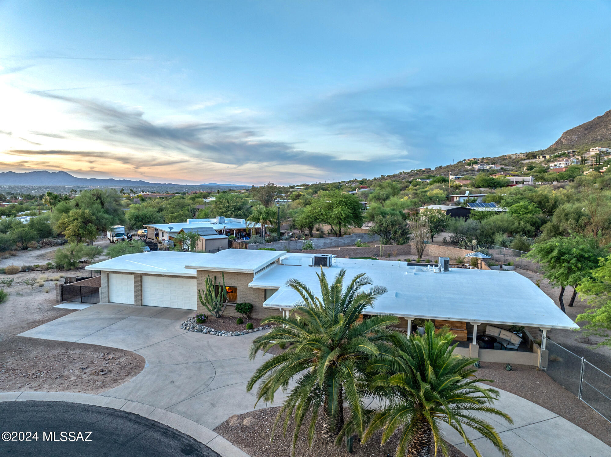 Looking for a single story home on Tucson's Northwest side? No HOA?  Culdesac lot? Mountain views & ...wait for it... an oversize 3 car garage? Check, Check, Check & Check. This beautiful home in Catalina Shadows was meticulously updated by owners who never expected to leave. From a blank canvas when they purchased to a resort style back yard, these owners spared no expense. Every room in the home has been updated. Tasteful use of neutral colors with the texture of wood in their design, I promise you will move in and have everything your heart desires.  The culdesac yard has natural desert to one side and great gardening space to the other. Plenty of room for a pool and/or a spa! Original Primary bedroom had the closet removed to enlarge the space.  Could easily be returned if buyer want.