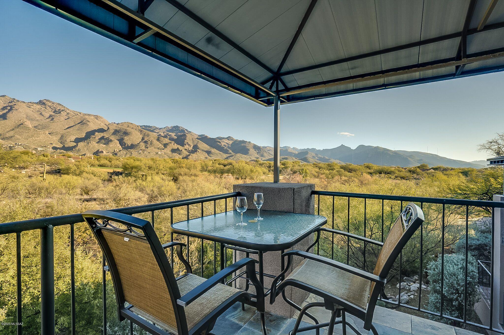 VIEWS! Renovated upper level 2 bedroom/1 bath furnished condo, that boasts AMAZING mountain, canyon, and golf course vistas. This condo is located in building 8 at The Greens and is one of the best locations. Currently this residence is rented through out the year as a vacation rental. The condo is a crown jewel that will entice you to kick back, relax, and soak in the stunning scenery.
Close to the main pool/spa and fitness center, only minutes from shopping, restaurants, and hiking. The property is next door to the award winning Ventana Canyon golf course and 1 mile from Sabino Canyon.
Views like this are rare and highly coveted.
Conventional financing is available.
