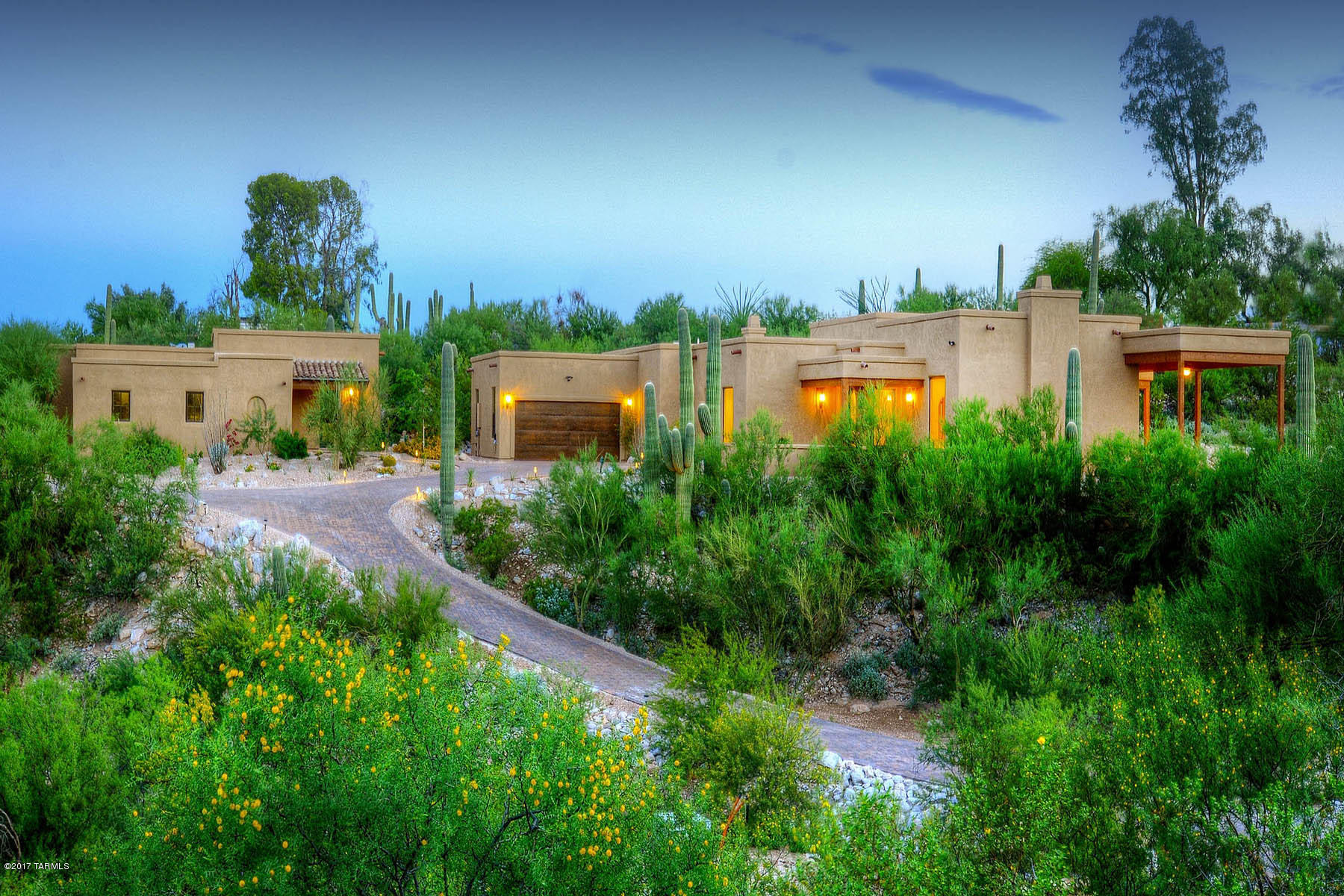 Outstanding, brand new 3282 sqft 3 bedroom home plus remodeled, detached 619 sqft guest house by master builder Paul Rondelli, high on  a one acre lot in the Old Foothills. Long and winding paver driveway leads to main house with courtyard entry, wrought iron arch entry door into family room with dramatic high ceilings, walls of windows with city and mountain views, colored concrete floors throughout, fireplaces in family room, living room and master and designer touches throughout. With an open flowing floor plan, luxury appointments include GE Monogram appliances, Danze plumbing fixtures, 8' knotty alder doors, Pella windows and exterior doors, all natural stone counters and baths. Gourmet kitchen with designer appliances, master with jacuzzi whirlpool tub and marble shower. 4 garage spaces (two for the main and two for the guest house), alarm system, surround sound in family room, WIFI smart thermostats and so much more.