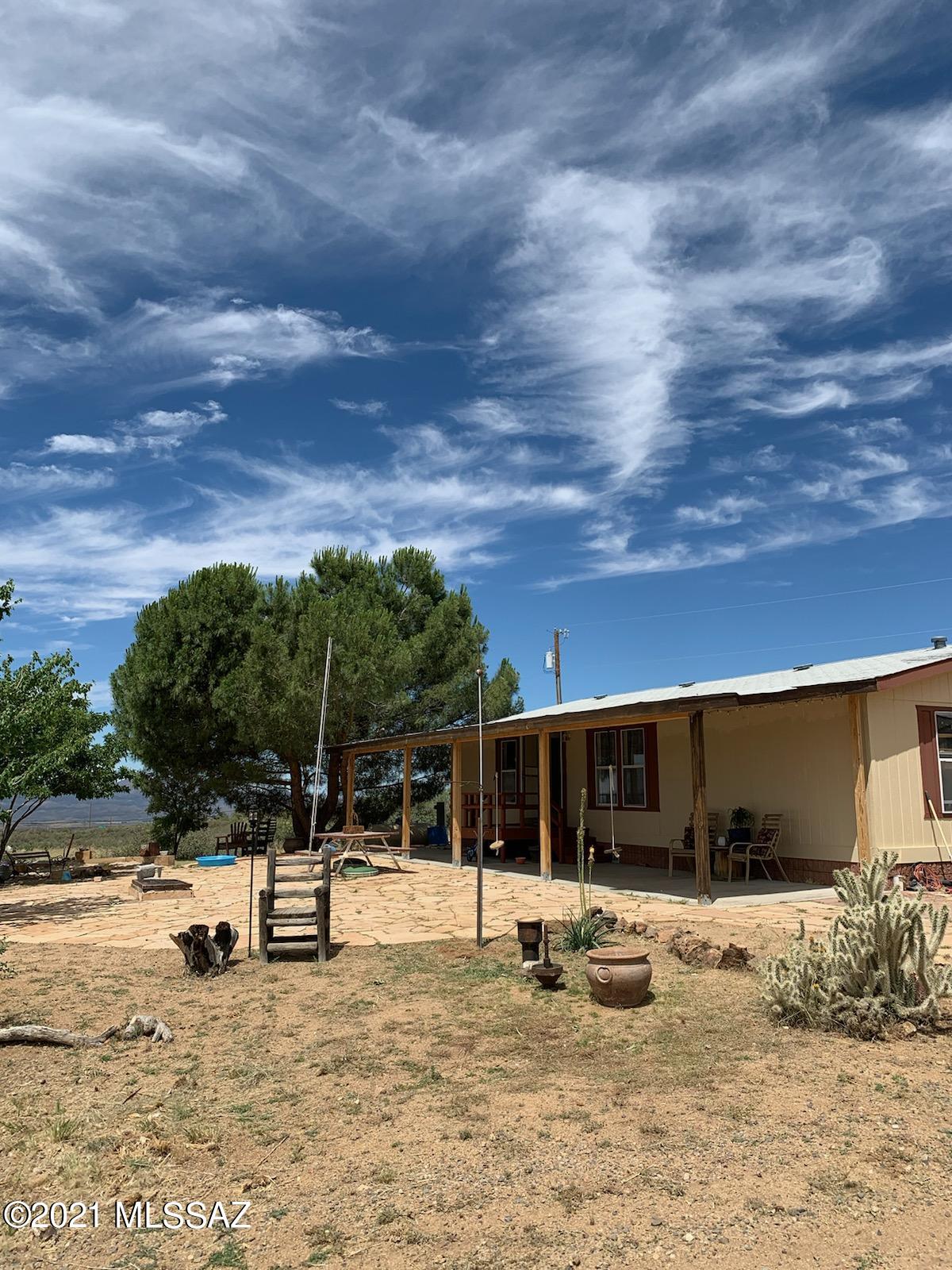 3BR/2BTH ON 1.38 ACRES JUST 17 MILES S OF PRESCOTT. UPGRADES- EXPOSED BEAMS, SHIPLAP WALLS, TILES KITCHEN AND DINING ROOM FLOORS, ALL INTERIOR WALLS TAPED AND MUDDED, TILED MASTER SHOWER, FULL LENGTH COVERED FRONT PATIO, CUSTOM KITCHEN BAR, AND CUSTOM LOFT ROOM. 8 FRUIT BEARING TREES, PEACH,PEAR, PLUM AND APPLE. WILHOIT IS TYPICALLY 15 DEGREES COOLER THAN THE VALLEY.  IF YOU ENJOY PEACE AND QUIET, SPECTACULAR VIEWS AND EVEN BETTER STAR GAZING NIGHTS YOU MUST SEE THIS HOME !!!