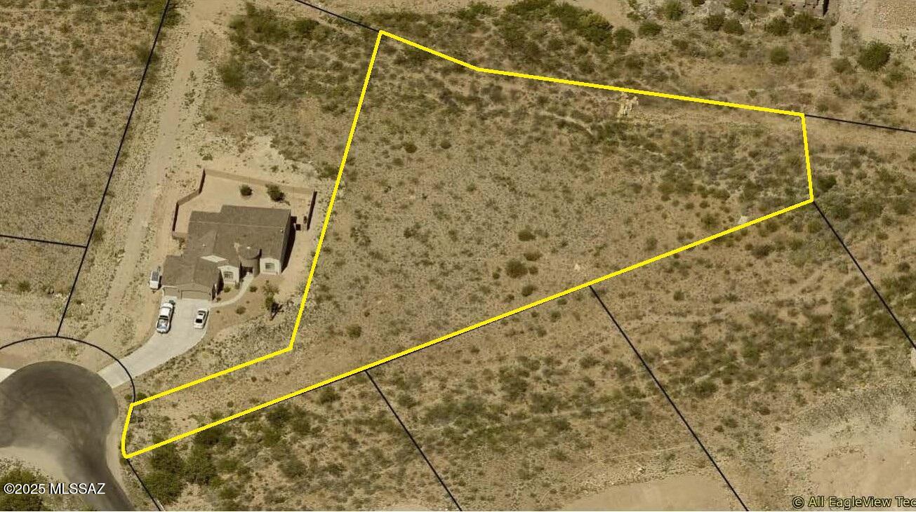 1 of 8 developed lots within minutes of Interstate 10 in the Vail School District. This one offers 1.22 acres and terrific views. Perfect location to make a quick trip to Sonoita. Ideal location for employees of the Copper World mine. Fantastic views of the Santa Rita Mountains and Rincon Mountain. Existing neighborhood has semi-custom homes with lighter CC&Rs allowing for RV storage on lot. Located in unincorporated Pima County offering lower permit and impact fees. 7 other lots available.  Only 11 minutes to Houghton Town Center, 13 minutes to UA Tech park, 23 minutest to the Tucson Market Place and Tucson Int'l Airport, 28 minutes to Downtown Tucson. . Existing Public report and receipt in documents