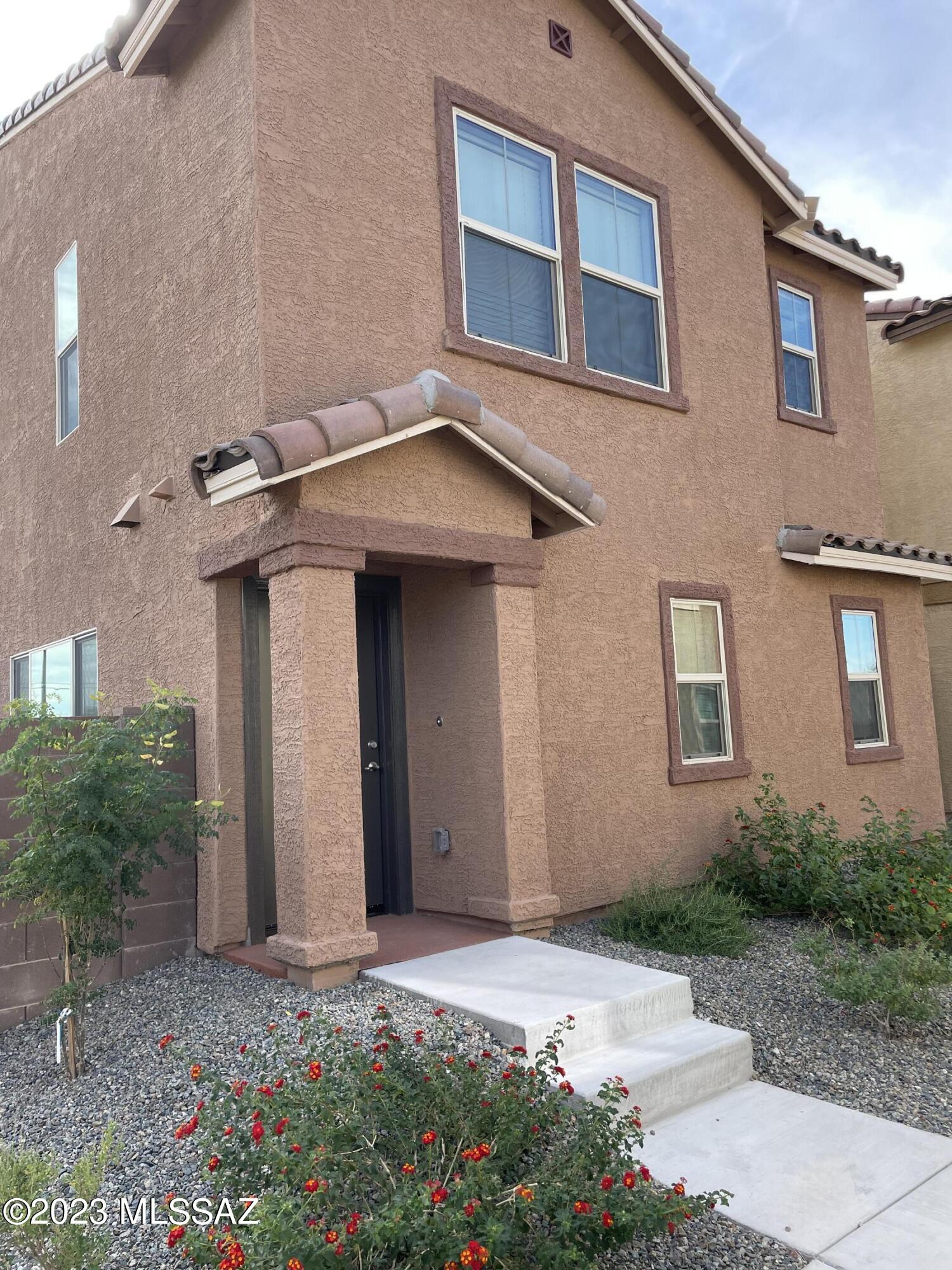 Private little enclave of NEW homes in convenient central location. Spacious ground floor features tile floors, quartz countertops, stainless steel appliances, loads of recessed lighting and HUGE pantry just off of the kitchen. Main floor also includes a powder room, access to the garage and front closet. Upstairs you will find three bedrooms PLUS a loft. The Owners suite has its own bathroom with a tub/shower combination. Spacious walk in closet PLUS a linen closet. There are peeks of mountain tops from the front window. Wander through to the loft, two more bedrooms, a hall bath with tub/shower combination as well as a  linen closet.  Small little outdoor area for sitting outside to enjoy the fall weather.