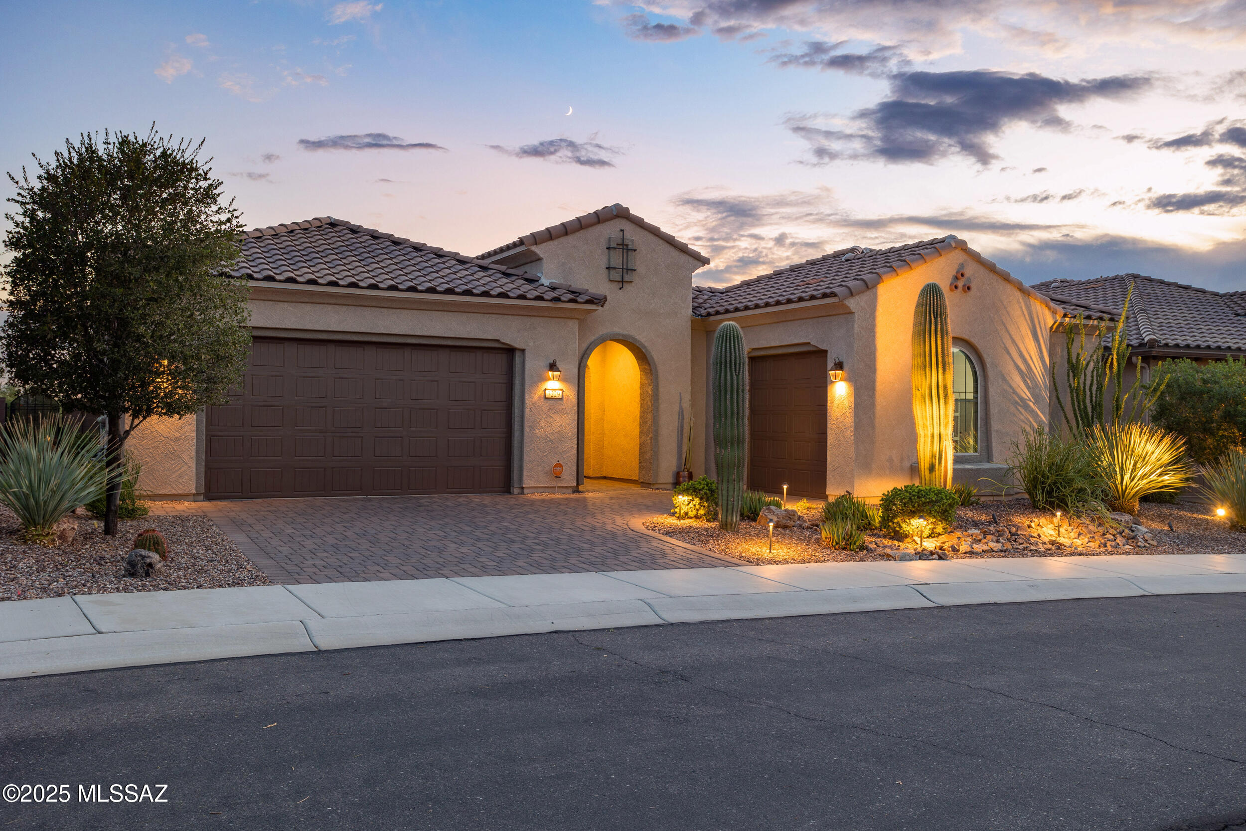 Live the ultimate resort lifestyle in this upgraded Journey model located in the +55 Del Webb Dove Mountain community. This 2 bed, 2.5 bath home with owned solar, and a den, also features a chef's kitchen with built-in refrigerator, extra cabinetry, and wine fridge—perfect for hosting. The owner's suite offers a sleek glass walk-in shower, while the private guest suite boasts a marble-tiled bath. Outside, enjoy your desert retreat with a 3-car garage, pool, spa, built-in grill, beautiful fire pit, landscape lighting, and panoramic views. Del Webb offers endless activities—swim, play pickleball, join a bocce league, or connect with neighbors at the vibrant Rec center. Every day feels like vacation in this home designed for elegance, comfort, and fun.