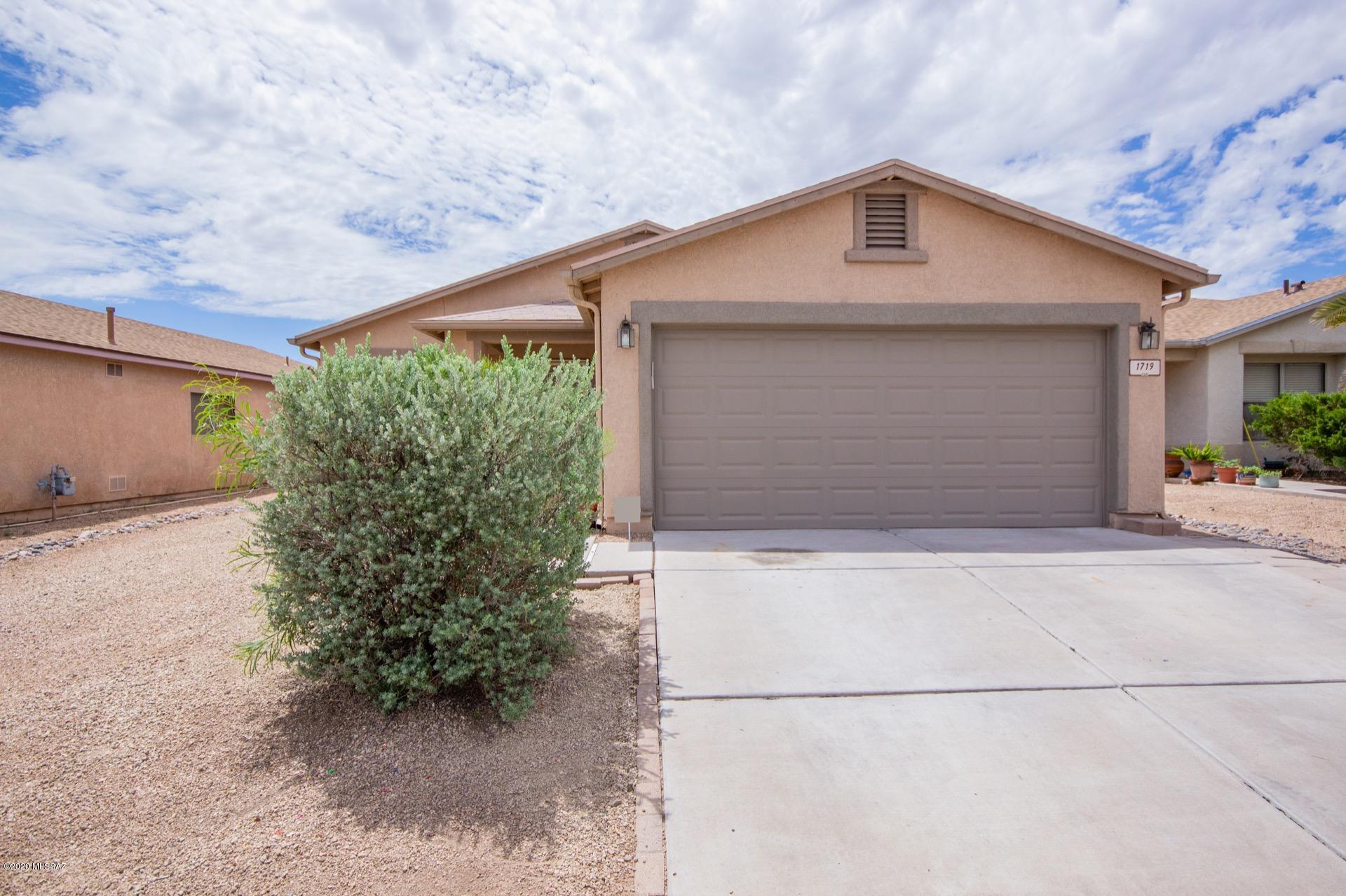 Gorgeous single level home in the desirable Community of Oakview at Midvale Park. Beautiful tiled floors, ceiling fans, window blinds, and spacious open floor plan. Center kitchen island, breakfast bar, stylish counters, pantry, black stainless steel appliances, and white cabinets w/hardware. French doors to patio, upgraded lighting, and wood look ceramic tile in all bedrooms. Ample closets, 2 pristine bathrooms, and interior laundry room w/storage cabinets. Pavered backyard patio, fire pit area, and desert plants. AC was replaced in 2016. This wonderful home is waiting for you!