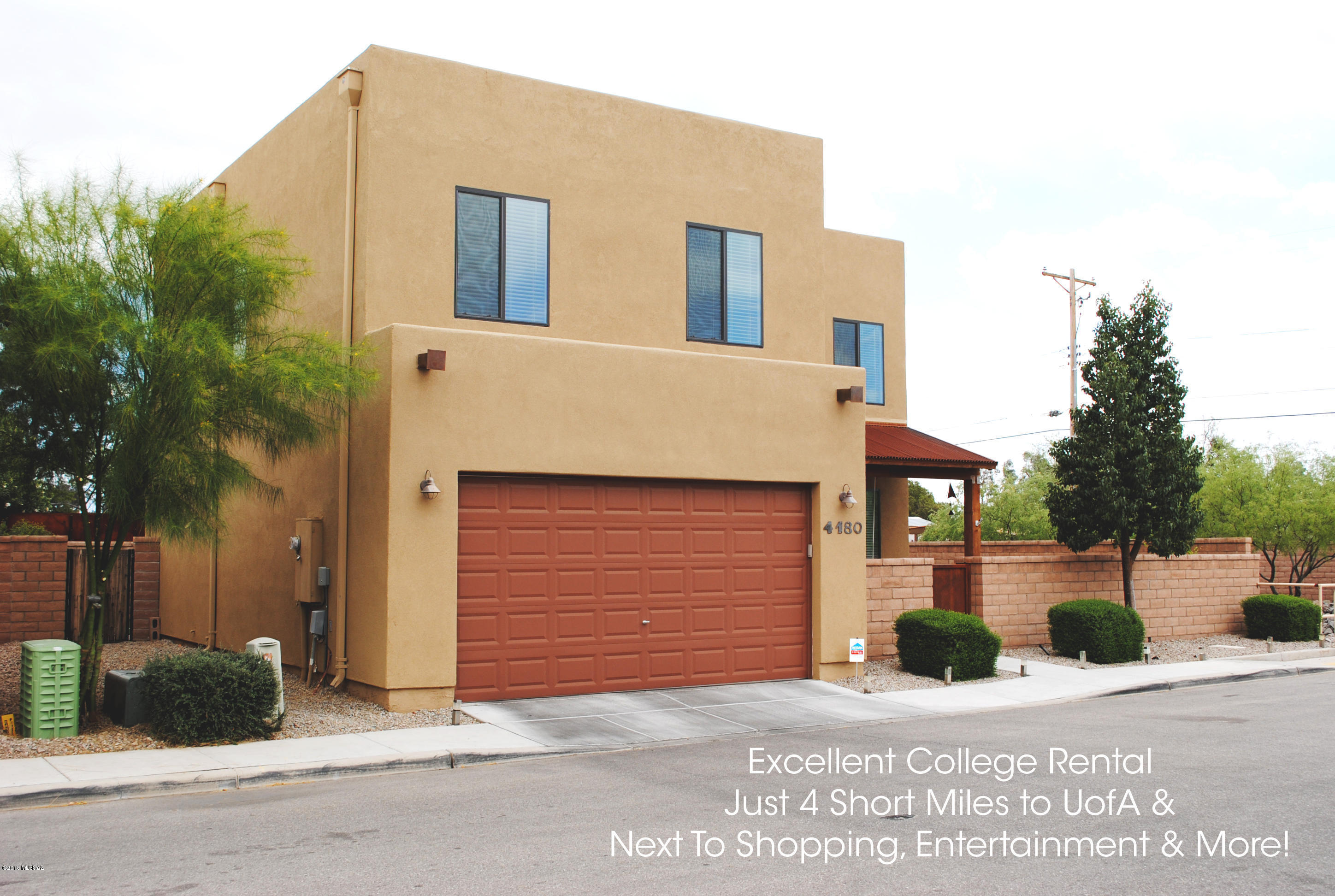 A rental for todays college student. Just 4 miles from the U of A, shopping, dining and LA fitness, great location. Enjoy a very modern home featuring the latest interior design, espresso cabinets, granite counters, wood plank and tile flooring. First floor features a open great room concept, open kitchen with stainless appliances, nice pantry with plenty of storage area. The second floor boast of 3 bedrooms, 2 baths, laundry room and storage closets. Large master suite and master bath, dual sinks, walk-in shower and large walk-in closet. Enjoy the outside, beautiful landscaped area with artificial grass, brick patio and gazebo, just super area for the afternoon barb b q. Front and back porch area. Enjoy the privacy of your own home, in school. Available 8/1/18 unfurnished. 12 mo lease