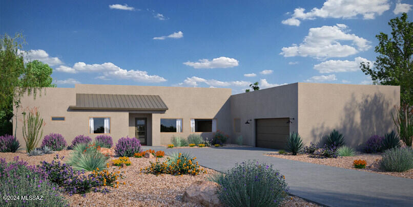 BEAUTIFUL Catalina Mountain views. Huge lot with NEW Saguaro floor plan with en-suites. 3 Bedroom, 3.5 bath, 3-car garage.  Nestled near the base of the Catalina mountains in a new home community. Home boasts gourmet kitchen, soft close cabinets and drawers with beautiful designer finishes. Tankless hotwater heater. NEW backyard landscaping!