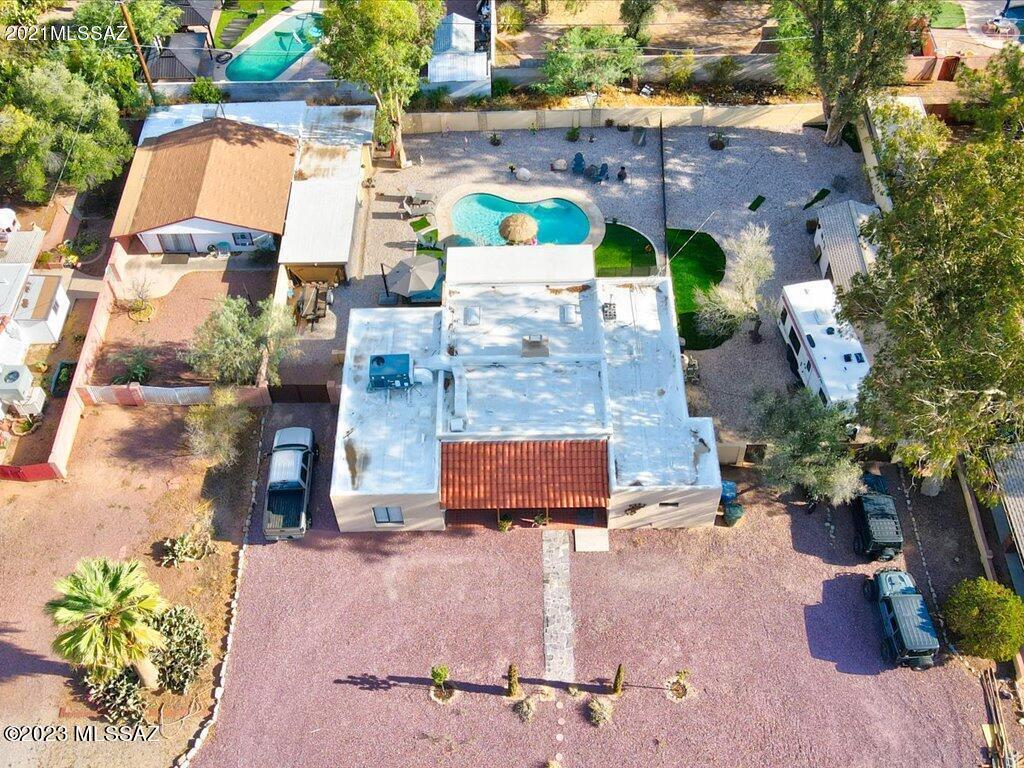 Amazing opportunity for this beautifully updated home in the fantastic, close to everything, Broadmoor Neighborhood. This historic, yet modern home features 3 bedrooms plus an office/den/4th bedrm & 2 full newly remodeled bathrooms. Gorgeous wood look tile flooring throughout, a cozy fireplace, recessed lighting,  plantation wood shutters, new kitchen appliances, walk in pantry, new AC with smart thermostat, water softener, water filtration system & programmable front door lock. Master has extra large walk in shower with dual shower heads & walk in closet with auto lighting.The low care, outdoor space is an entertainers delight featuring a new saltwater pool with removable barrier fence, an above ground hot tub, 3 sheds/workshops, smart irrigation controller, outdoor tile under the covered patio, fruit trees & artificial grass. Home is on the historic registry allowing for a 50% reduction in property taxes.