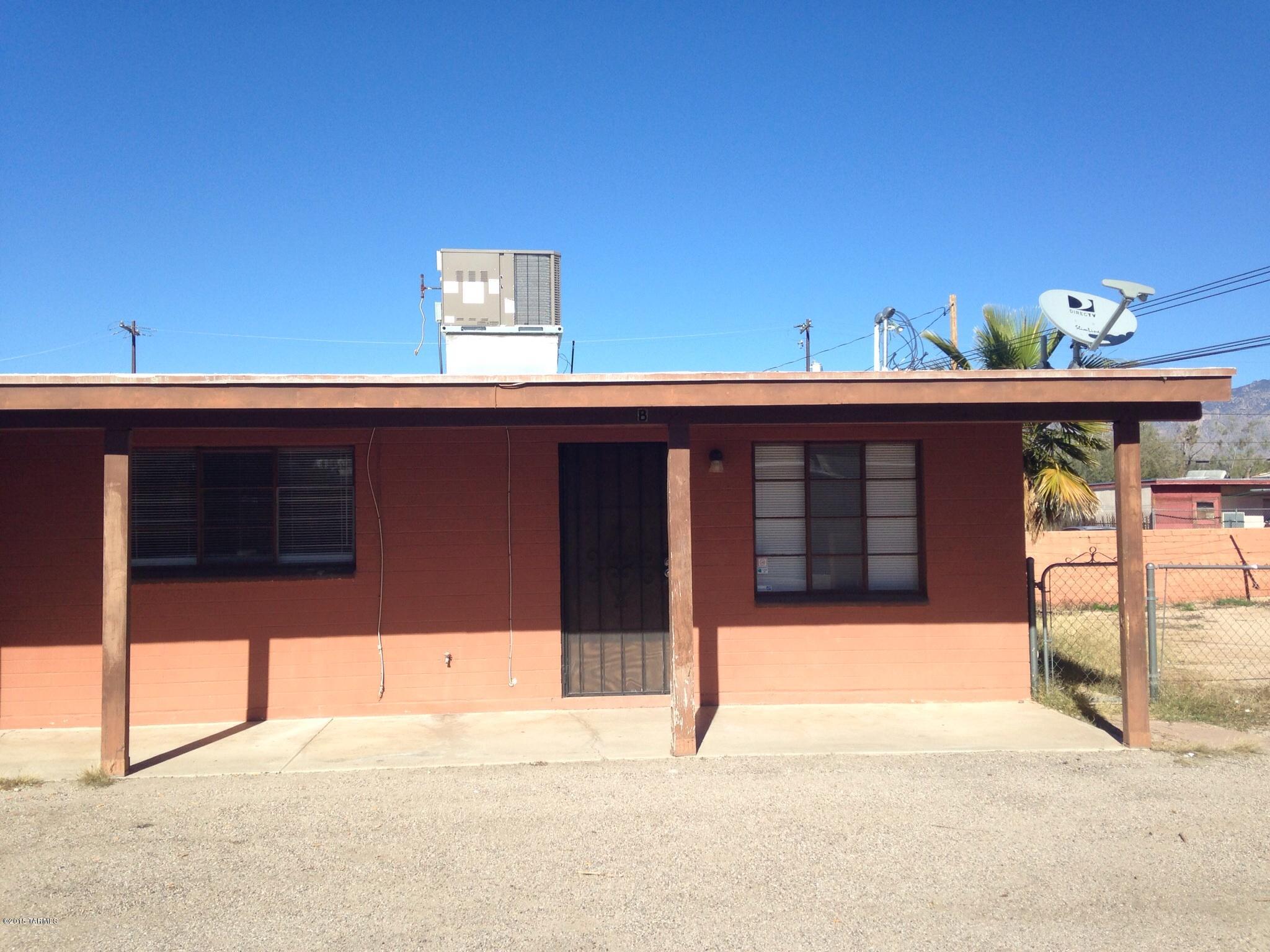 Convenient central location, 2 bedrooms, 1 bath duplex with central AC. lovely side yard with views of Catalina Mountains, tile floors. Includes water